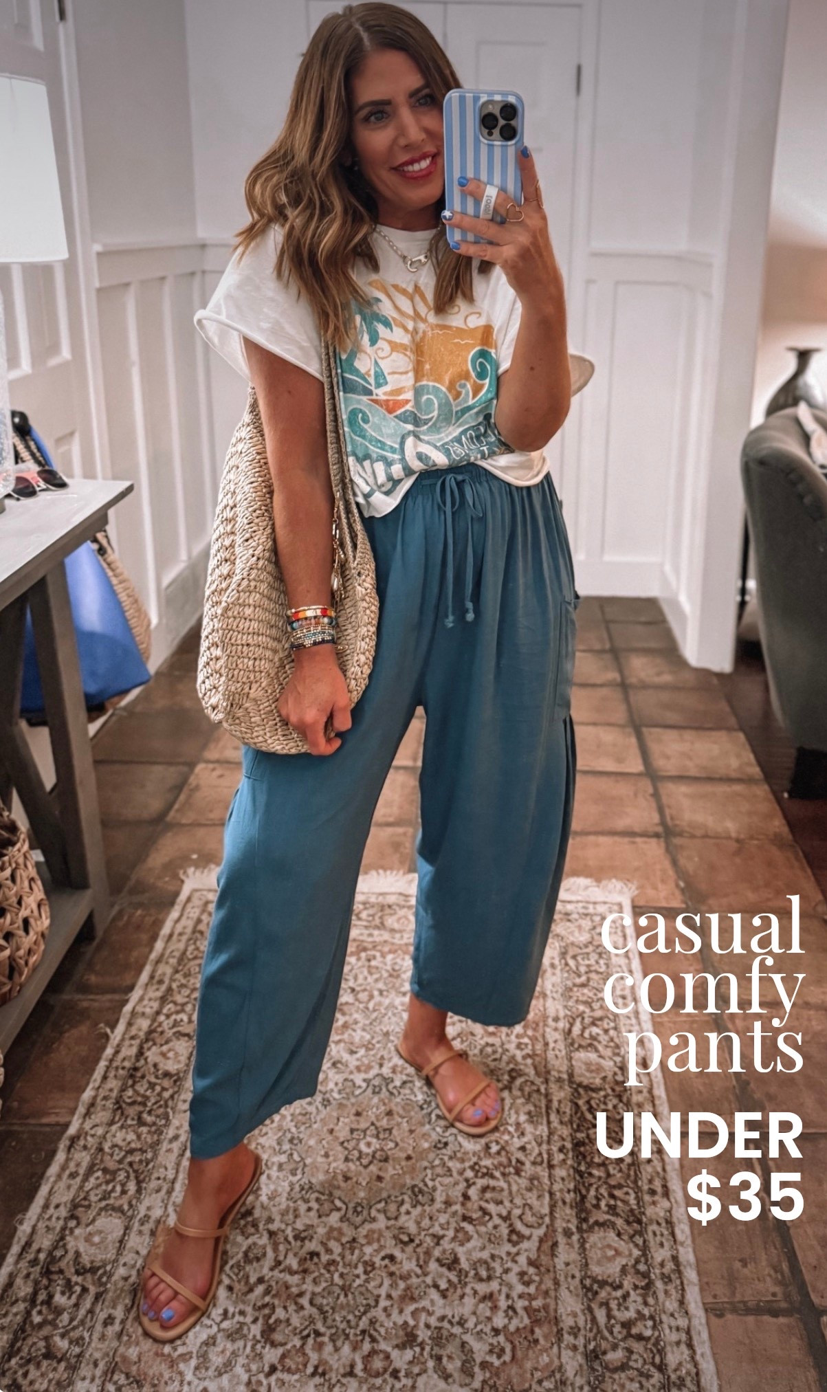 Comfy casual Amazon outfit for summer ☀️High-rise linen blend barrel pants under $35! I'm in a medium. 100% cotton, graphic tee size large. Look for less sandals true to size. My crochet bag is old, but I will link some similar options.

#LTKMidsize #LTKSaleAlert #LTKOver40