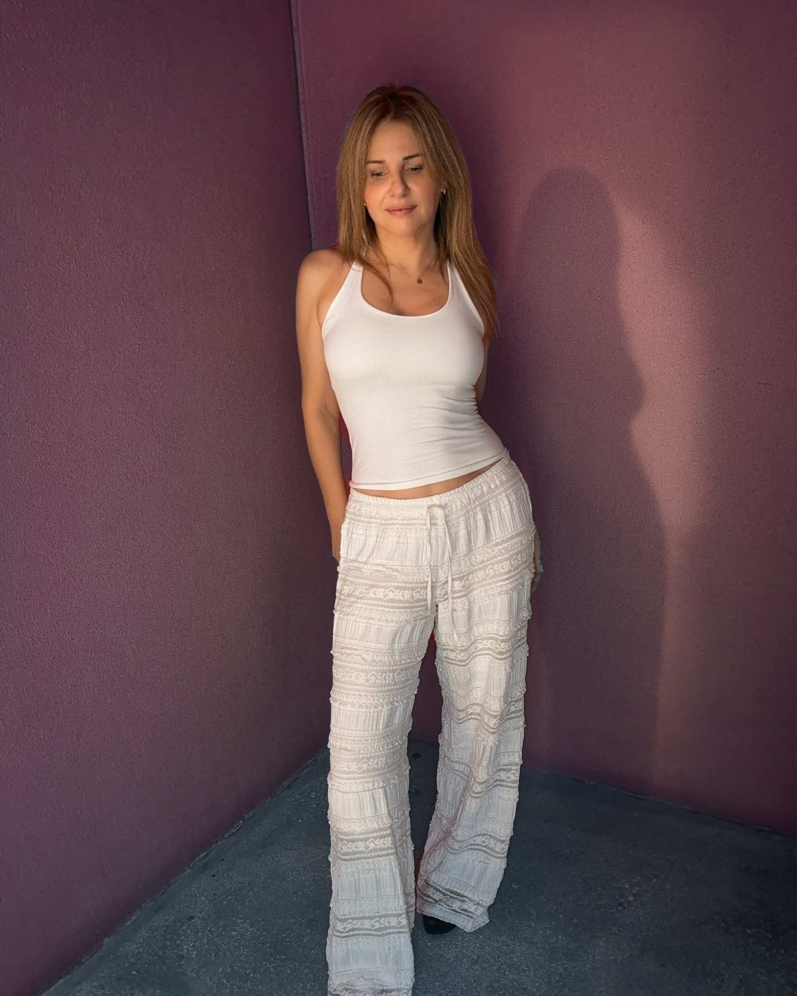 Off white, almost ivory, matching resort wear outfit for the warmer weather in Spring and summer. And a cute, comfortable outfit for brunch 🥂 I’m wearing an off white racerback tank from the Clean Lines collection at Free People. (sadly not avail atm) and wearing the Aiden frilly lacy pull-on pants also from Free People (and also not avail atm) similar styles linked below to get this look  🤍

#LTKootd #LTKMothersDay #LTKFestival