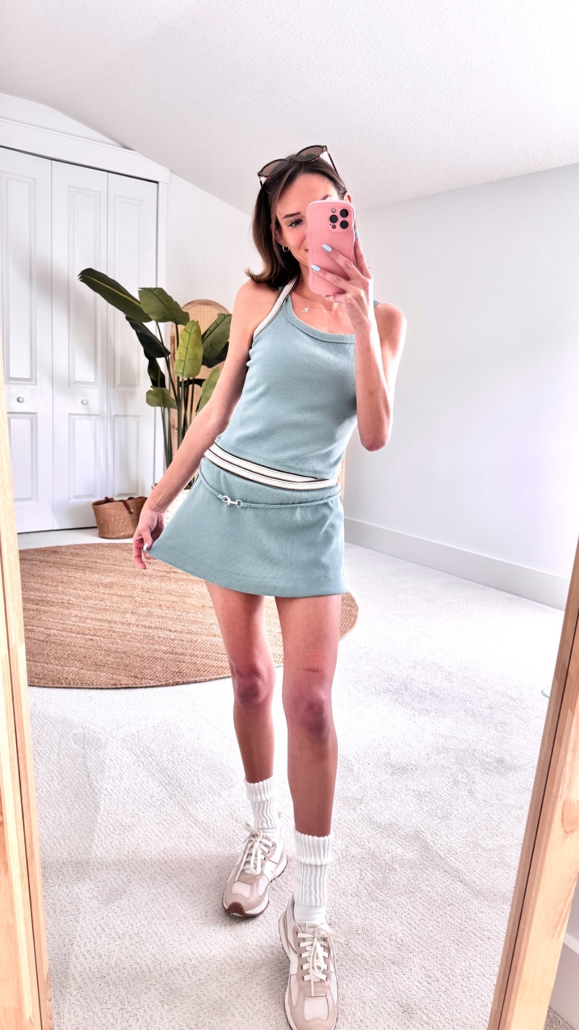 Halter neck top with a matching skort for spring? Yes, please. This skirt has shorts attached underneath and features a cute clasp in the front. Get 30%OFF with code [BRITTANYN30] today!

#LTKSpringSale #LTKActive #LTKSaleAlert