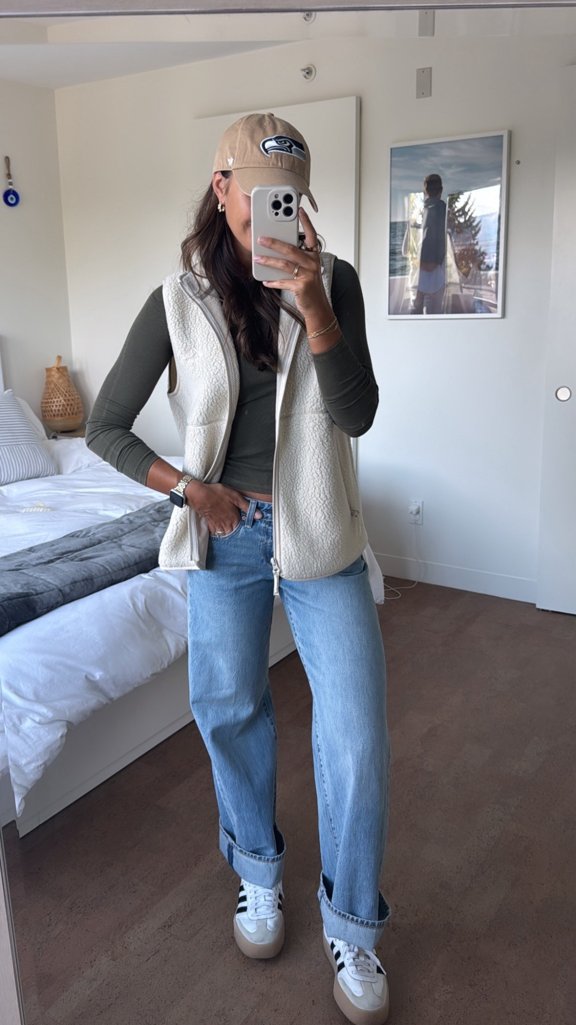 Top XS 
Vest M
Jeans 25