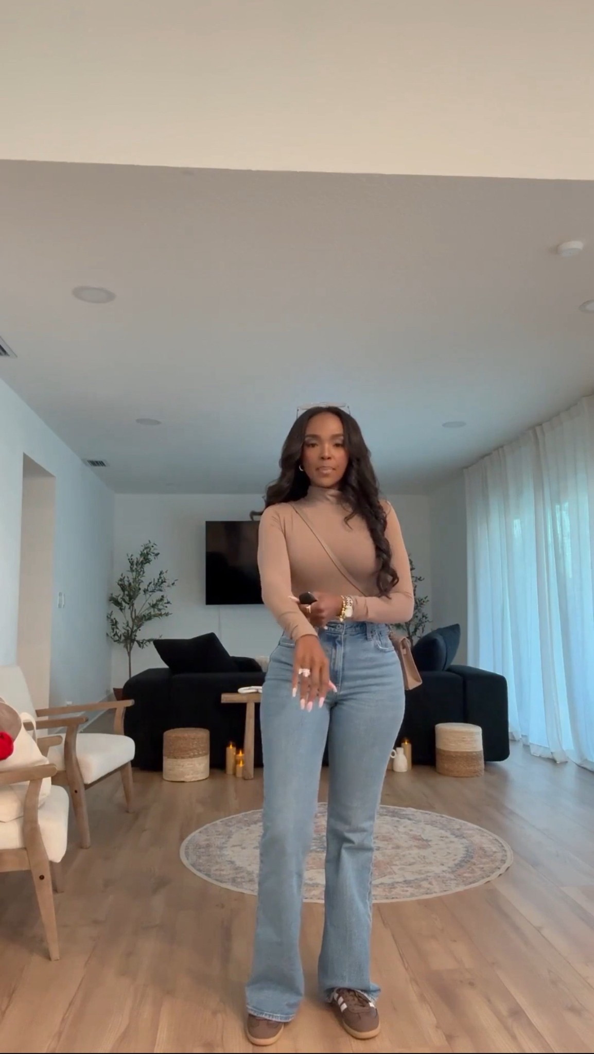 A simple, clean neutrals moment — pairing a fitted taupe turtleneck with classic flare denim and the brown @adidas Sambas for an elevated everyday look. Save this post for your next casual outfit idea.

Perfect for errands, coffee runs, or a relaxed winter weekend out.

neutral casual outfit ideas, flare denim outfit, Samba sneakers styling, everyday winter look, minimal neutral wardrobe basics.

📏 Sizing: Top (TTS) • Jeans (TTS) • Shoes (@adidas Sambas – brown)
Measurements: 5’4” · 138 lbs · 34D · 27” waist · 40” hips

✨ Everything linked below for easy shopping

Follow me on Instagram and YouTube @kirasfashionfinds

#LTKootd #LTKPetite