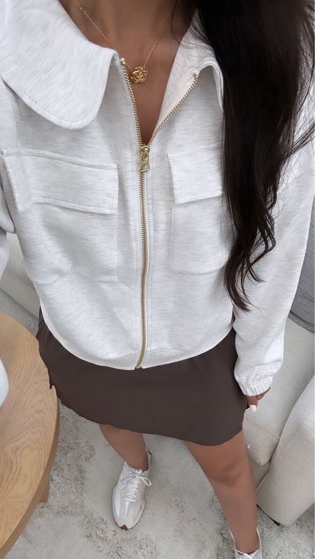 Outfit Idea:
Varley Zip Up sweater in size Small
Target skirt with built-in shorts
New Balance 327

#ootd #outfitideas #athleisure #forher #womensoutfits #outfitideas #outfits #traveloutfit #tenniscore 

#LTKTravel #LTKStyleTip #LTKSeasonal