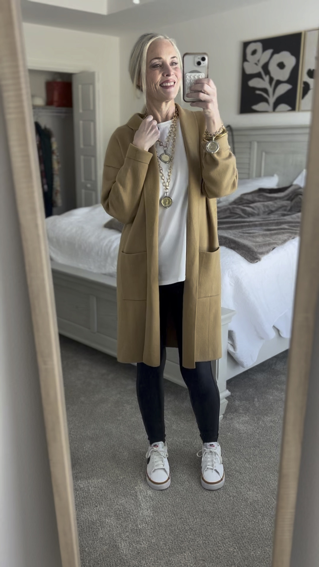 Today’s OOTD is another version of the same look I wear on repeat. This coatigan is a medium in the  color light camel. I love the structure and stretch it has to it. It can very easily be dressed up based on the feel and fit of it. The leggings are black faux leather from Walmart. They are really comfy and have light compression. If you prefer a little less of a tight fit, then these are the ones for you. I like having these in my closet for days when I want a less tight fit. I’m in a medium. The white tee is from Amazon and is a large which is a size up for me. If you want a looser more relaxed fit, size up one. I finished it off with my Nike Court Legacies and my favorite assortment of gold jewelry. 

As a reminder for reference, I’m 53, 5’8, and 140ish lbs. 

#LTKTreatYourself


#LTKplussize #LTKmidsize #LTKfindsunder50