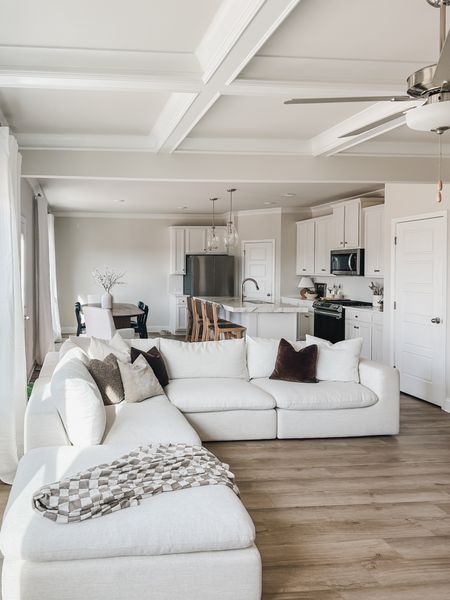 Cozy modern neutral style in my open concept living area! Sharing a mix of high end and affordable furniture/decor. 

Amazon finds, Target finds, furniture favorites, Target furniture, fluted dining table, counter stools, throw pillows, comfy home style 

#LTKstyletip #LTKhome #LTKsalealert