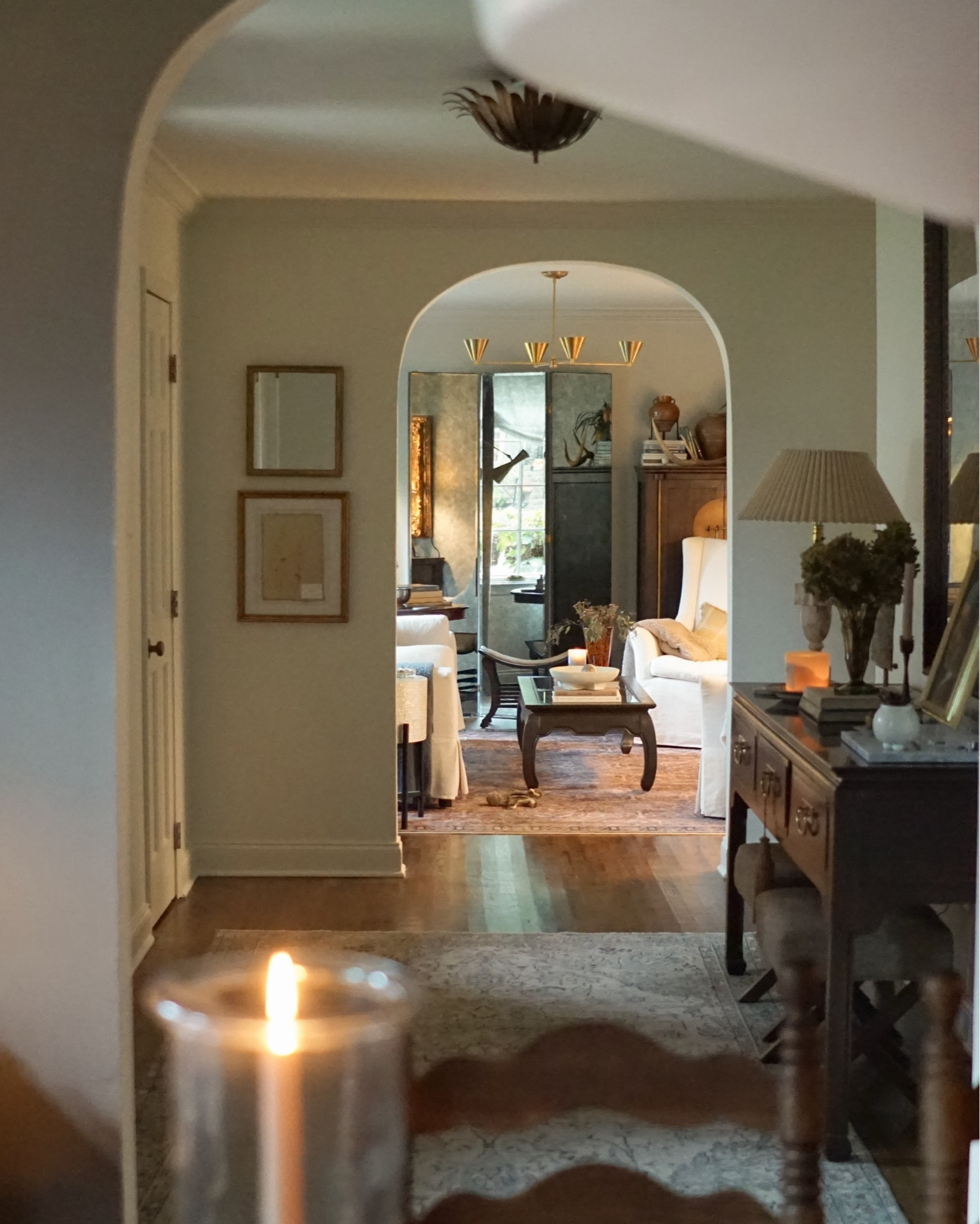 The view from the dining room to the sitting room featuring one of Piglet’s many squirrel toys 🐿️

I’m very excited because I finally found a jute rug that I love for a good price last night, so I’ll be switching out the sitting room rug very soon. I also think I am going to hang some art on the side of that vintage cabinet so it’s reflected in the trifold mirror. I think I have the perfect pieces and the perfect frames already — just need to order some mats and glass 👀