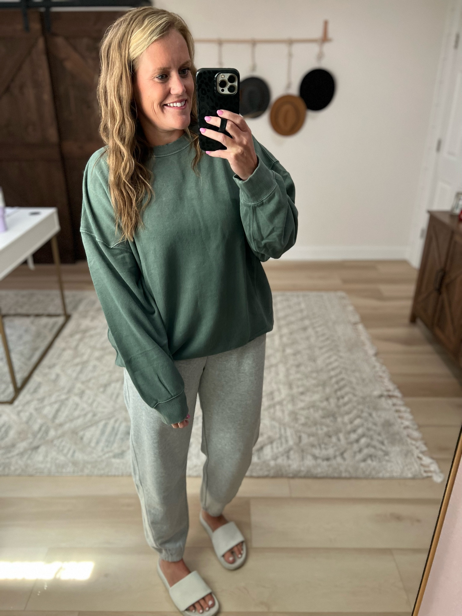 Aerie pullover 
sweatshirt 
green sweatshirt 
grey sweats 
grey sweatpants slides 
white sandals 

#LTKSeasonal #LTKFind #LTKfamily