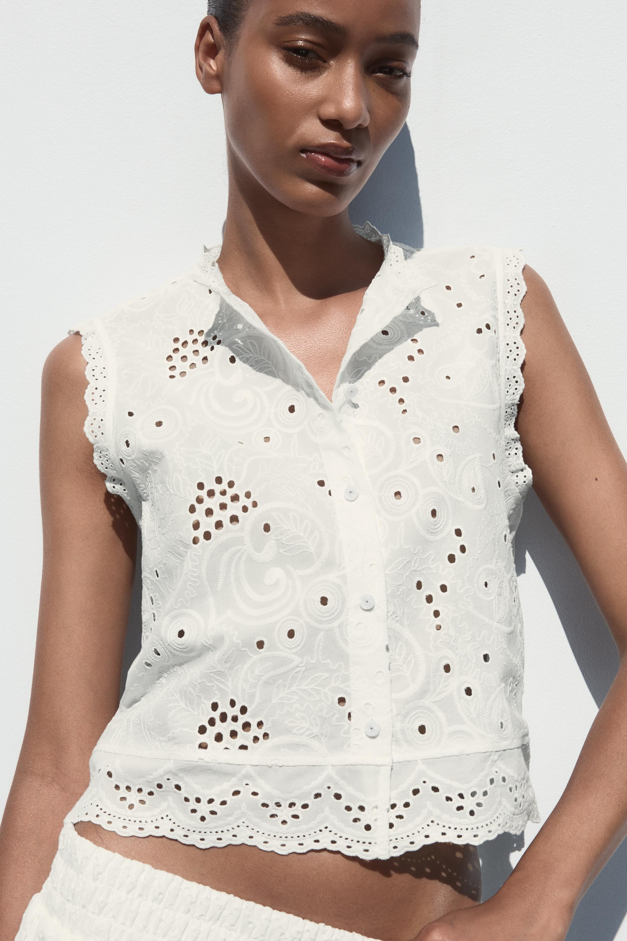 Round neck sleeveless top. Tonal embroidered eyelet detail. Front button closure. | Zara US