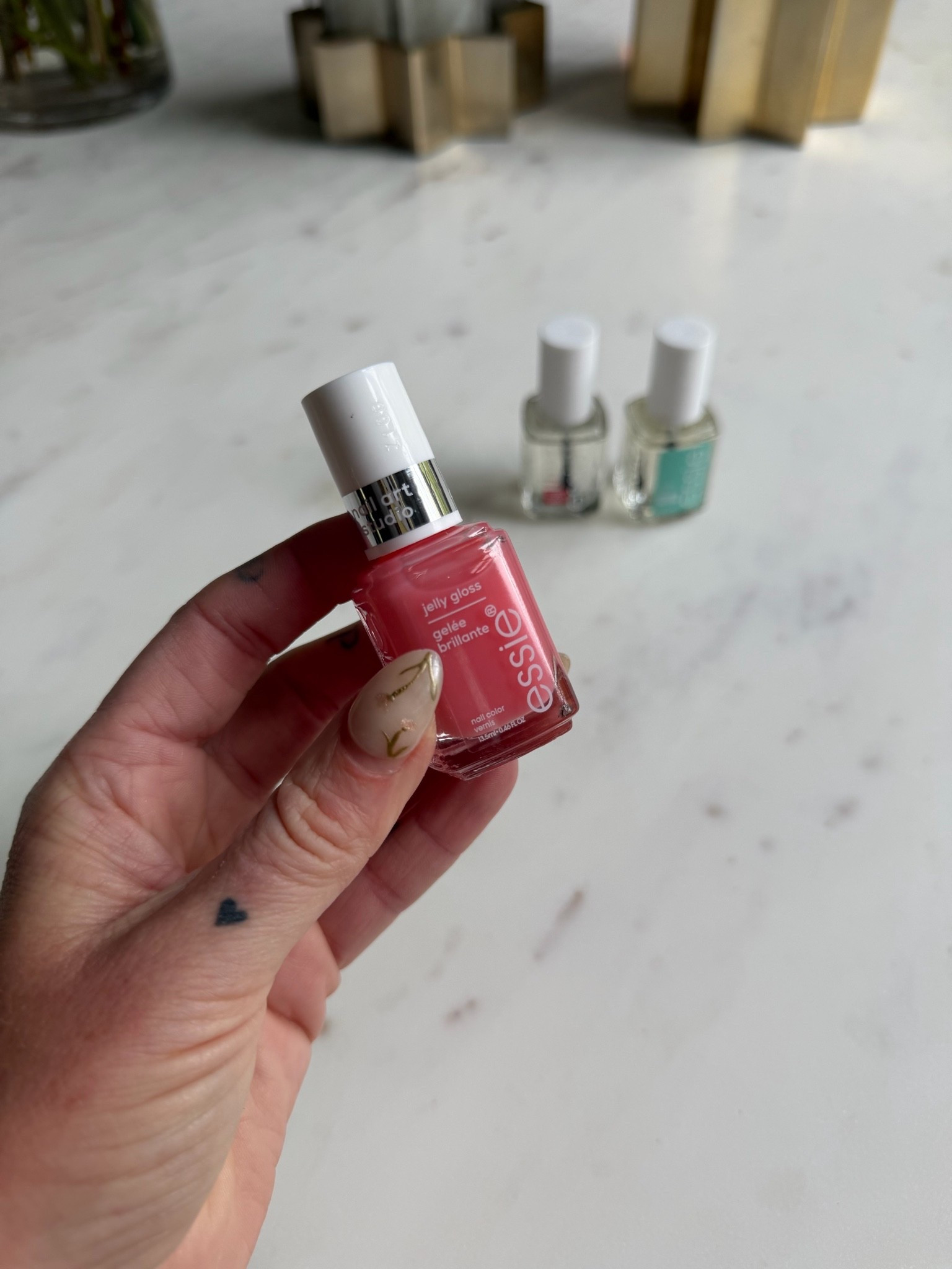 Viral pink nail art and nail polish colors trending for summer 2026
Slushy sun jelly pink color and Essie top coat for shine and long wear
Target finds and ultra beauty Haul