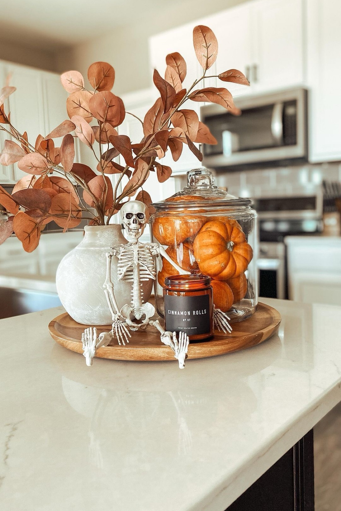 Fall decor ideas for your kitchen counter! A simple but spooky cute look for your entryway, bathroom, or any nook or counter space. #halloweenkitchendecor #fallkitchendecor #fallkitchencenteriece 

#LTKSeasonal #LTKHome