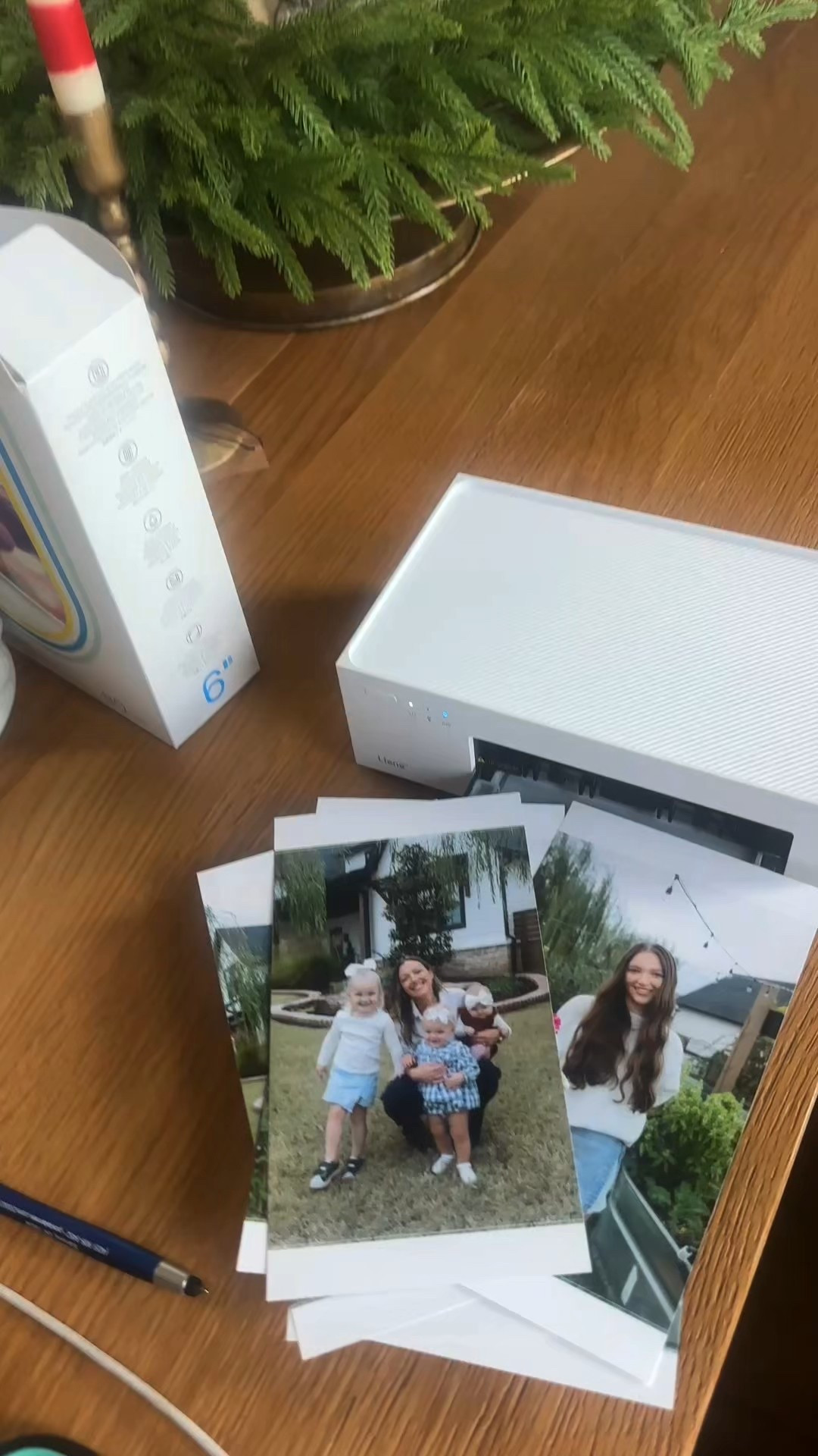 Christmas crafting ✨ the picture quality of this bluetooth photo printer is 💯. Made my 2025 Christmas ornaments from my phone camera roll 😘.  

#LTKHome #LTKHoliday