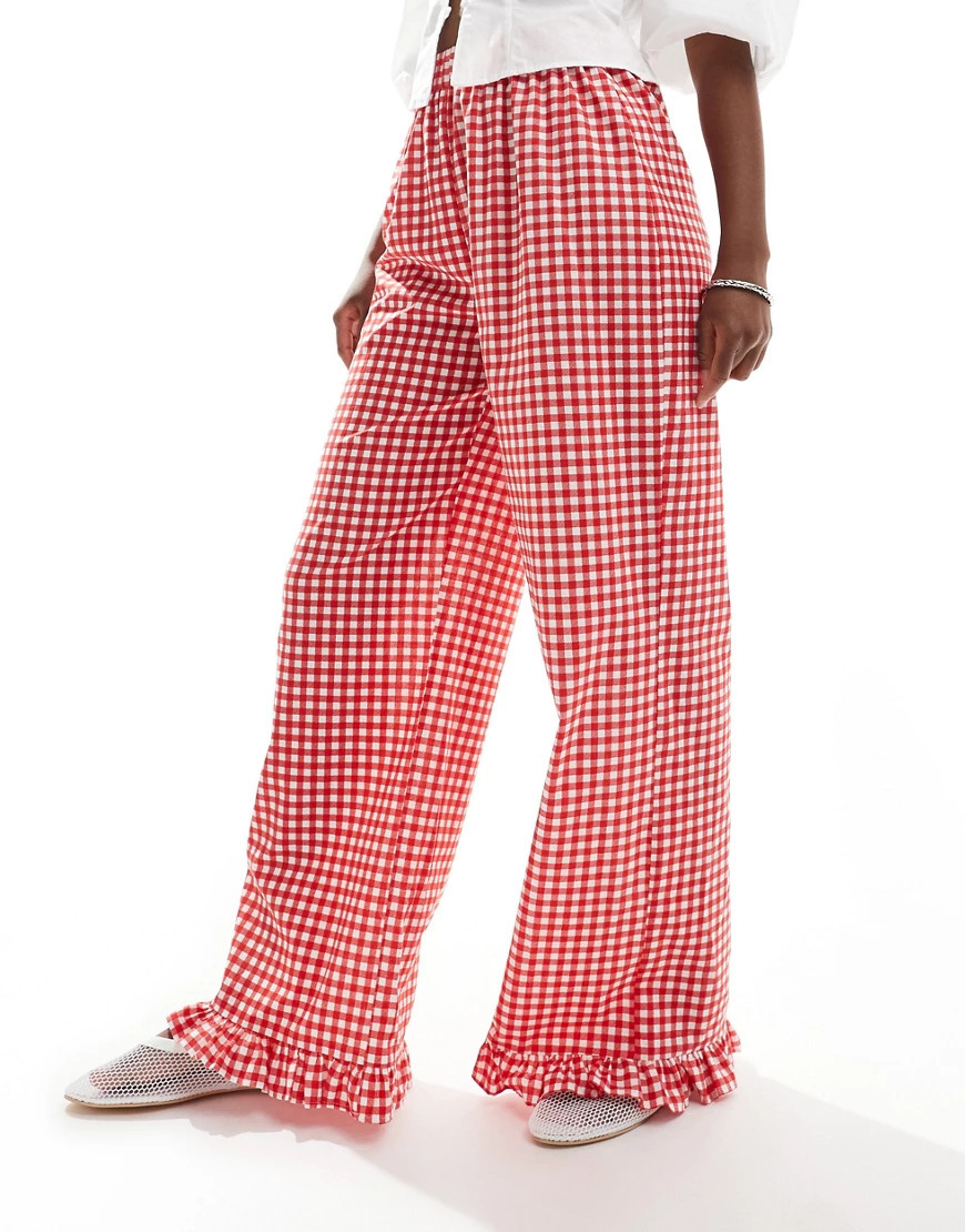 ASOS DESIGN gingham pants with frill hem in red | ASOS (Global)