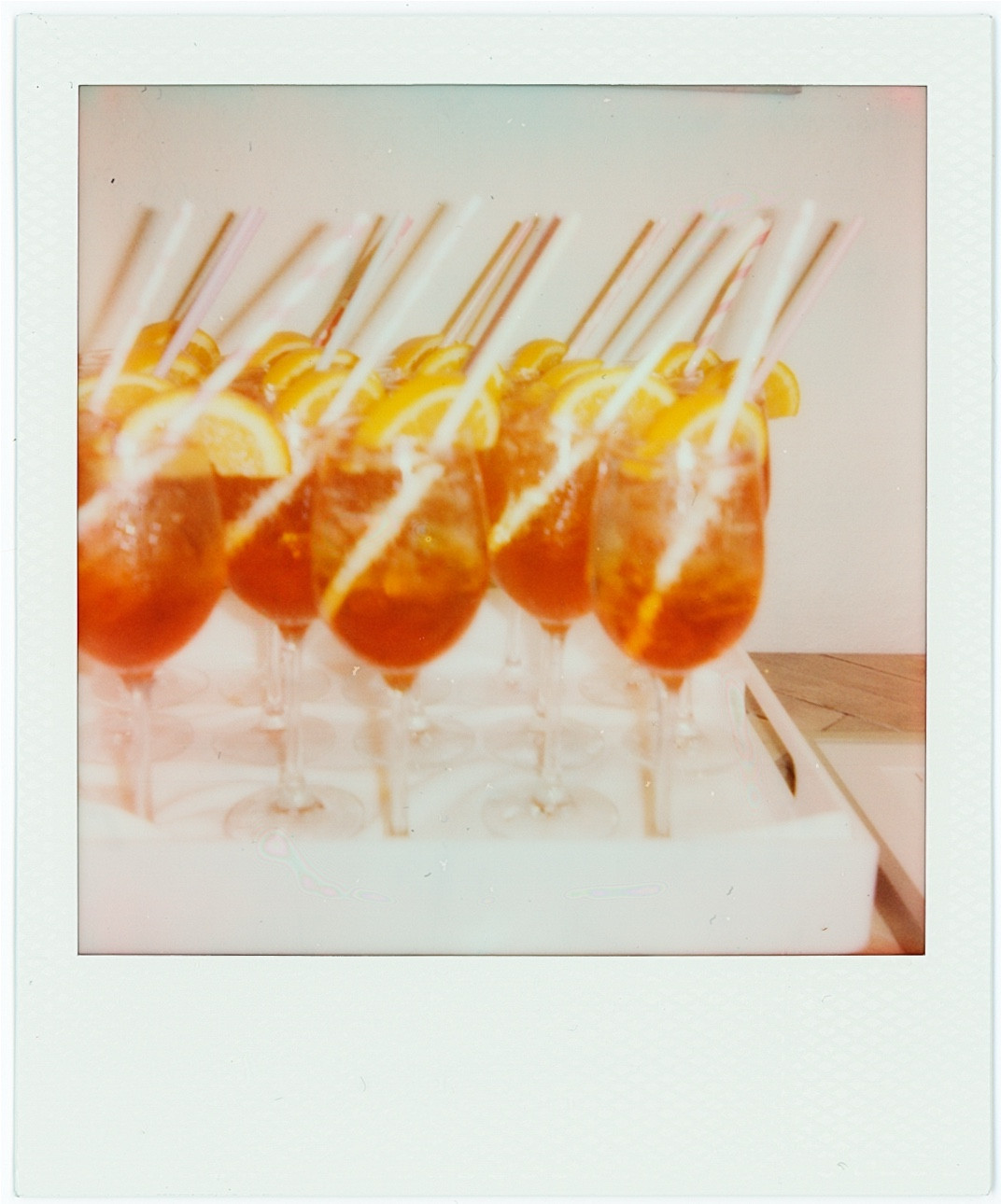 Aperol Spritz Scenes 🍊☀️

Sip through these last sweet days of summer ☀️ with this refreshing NA Aperol Spritz recipe!

🌸 Lapo’s x TÖST Rosé Spritz (Zero-Proof)
Ingredients:
- 2 oz Lapo’s Non-Alcoholic Aperitivo
- 3 oz TÖST Rosé (white tea, elderberry & citrus)
- 1 oz soda water (optional, for added dryness and fizz)
- Ice
- Garnish: orange or grapefruit slice, rosemary sprig, or edible flowers

Directions:
- Fill a large wine glass or goblet with ice.
- Add 2 oz Lapo’s Aperitivo.
- Pour in 3 oz TÖST Rosé.
- Add a splash of soda water if you want it crisper and lighter.
- Stir gently to combine.
- Garnish with a grapefruit wedge or sprig of rosemary.

✨ Flavor Profile:
- Bittersweet orange from Lapo’s
- Floral, fruity dryness from TÖST Rosé
- Herbal lift from rosemary or tea notes
- Super refreshing with a layered, elegant vibe

Zero proof, 100% vibes. 🥂

🍊 How to Use Orange/Grapefruit Peel as a Garnish:
Use a fresh orange peel twist (about 2–3 inches long)
→ Twist it over the glass to release the oils before dropping it in
Or add a thin orange slice or dried orange wheel if you want more visual appeal

Bonus: Add a Herb (Optional)
If you want to add some extra depth (like grapefruit would give), a sprig of fresh rosemary or thyme works really well with both Lapo’s and TÖST Rosé.