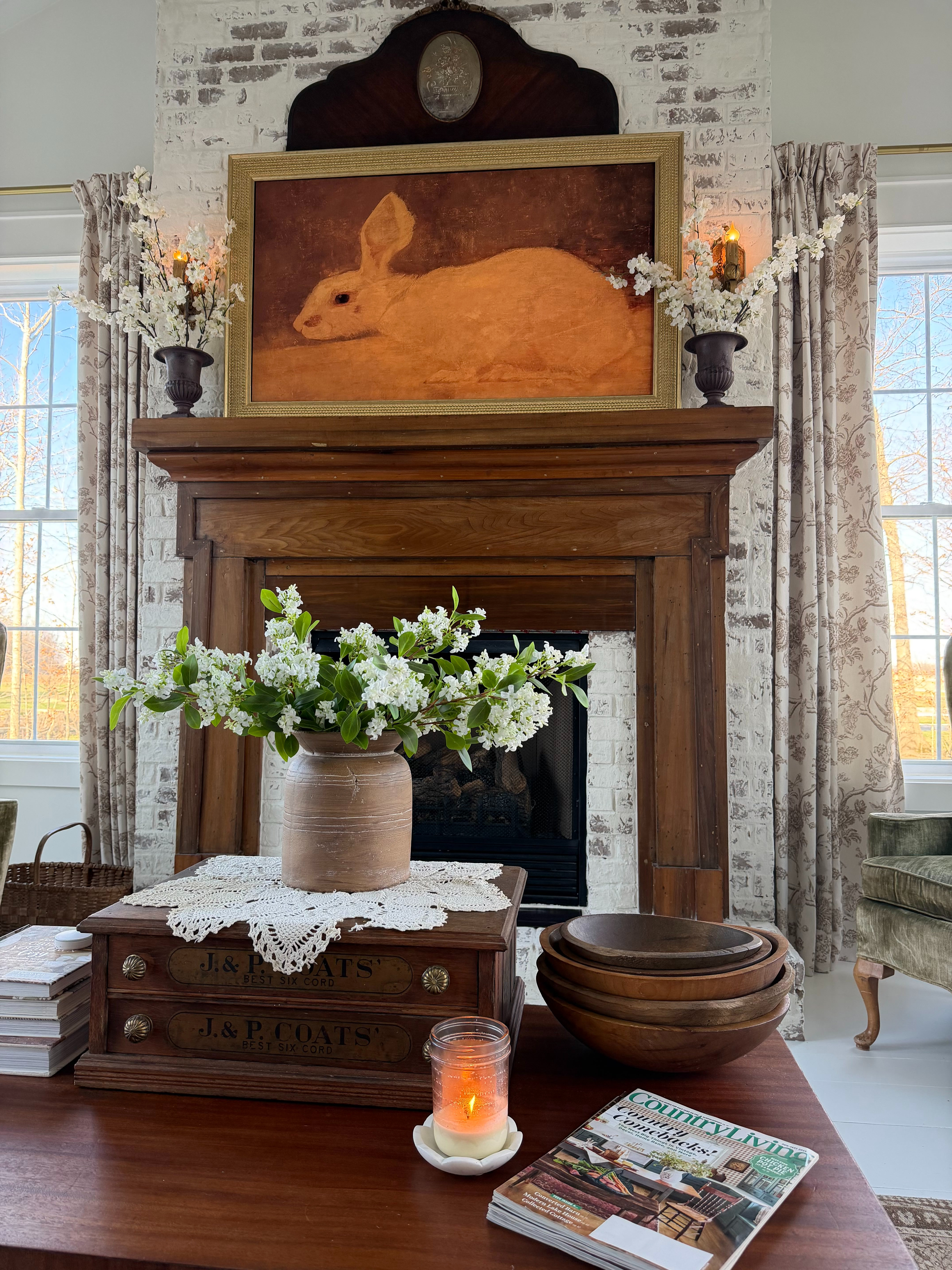 This is our current coffee table and fireplace mantel look in our sunroom. We love this space because it offers so much natural light.  

 #LTKSeasonal #LTKHome