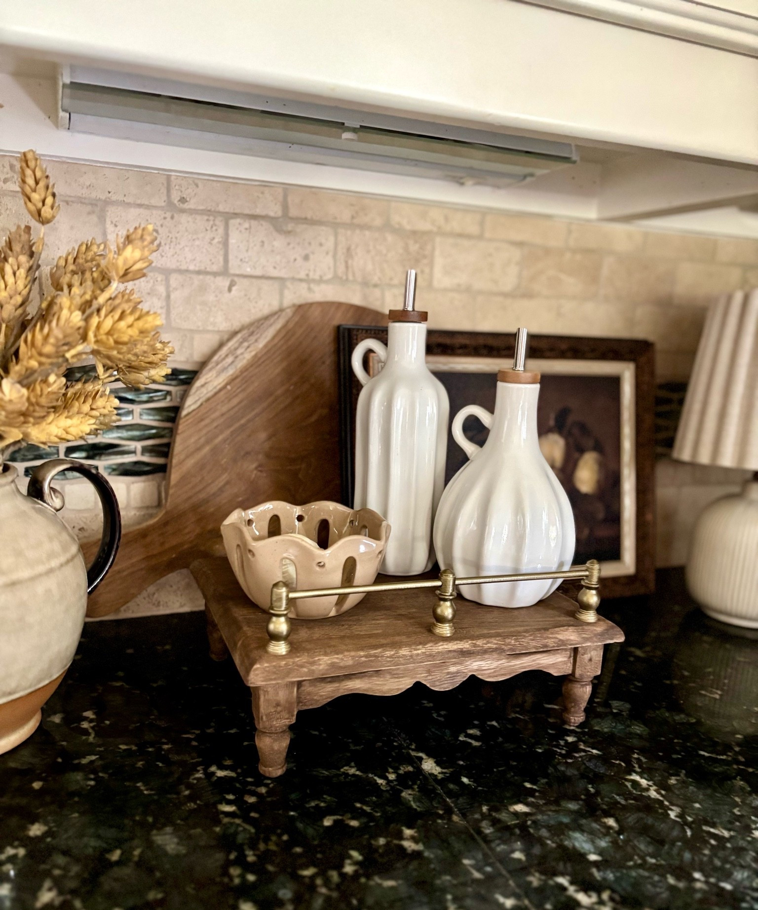 Fall kitchen styling!  Finally got my hands on this gorgeous Magnolia cookbook riser and it’s so good!  Can be used as a riser or raise to hold a cookbook!  The brass railing gives it such an elevated look!

#LTKHome #LTKSeasonal