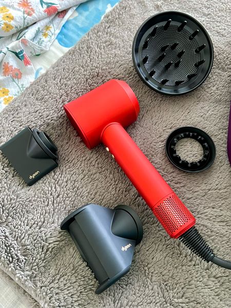 Here’s all of the attachments you get with the #nsale Dyson hairdryer! You get the dryer itself, the diffuser, styling concentrator, wide tooth comb, fly away attachment and a gentle air attachment! On top of all of those, you also get the beautiful purple storage box! 

#LTKsalealert #LTKbeauty #LTKxNSale