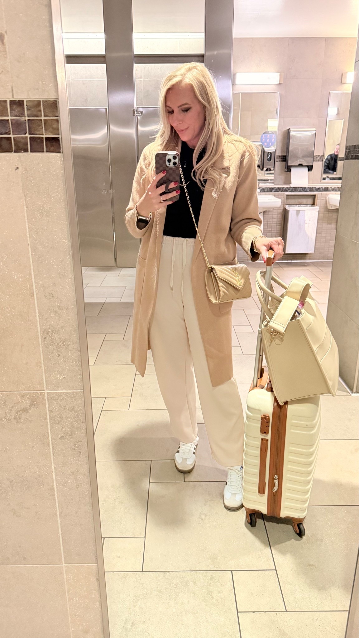 Travel Outfit - luggage linked too! It’s time for holiday travel and I’m here for a cute set with a long coat and sneakers! 

#LTKFindsUnder100 #LTKTravel #LTKHoliday