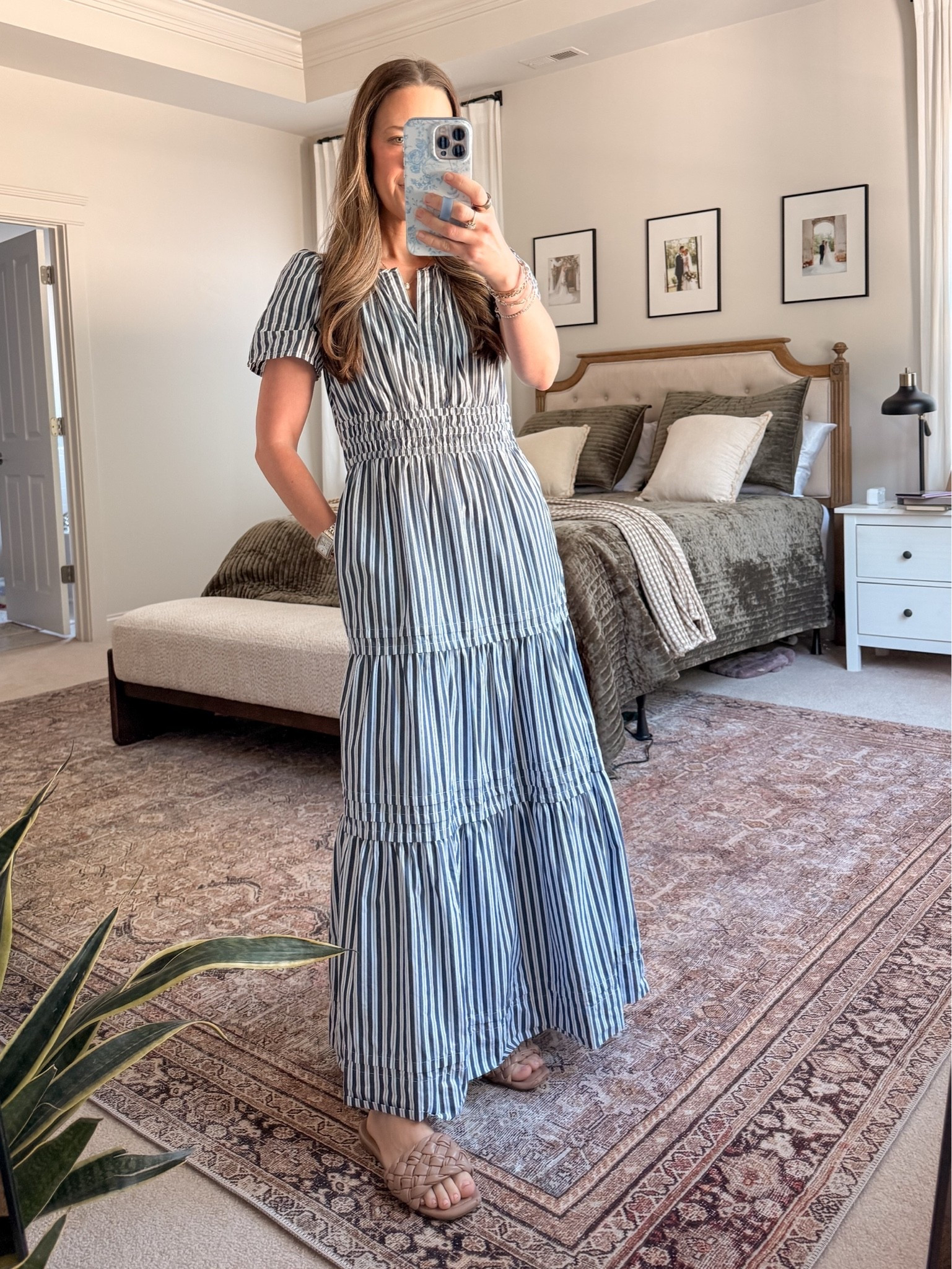 Quince summer dress 🤍💙 The perfect blue & white striped maxi dress for summer—think beach vacation, family photos, brunch, baby shower, and casual summer wedding guest. Smocked waist + flowy tiered skirt = comfy but still polished. I’m wearing XS (I’m 5’4” for length reference).

Use my Quince code: INFG-26LINENANDLIGHTCO10 ✨

#LTKSeasonal #LTKootd