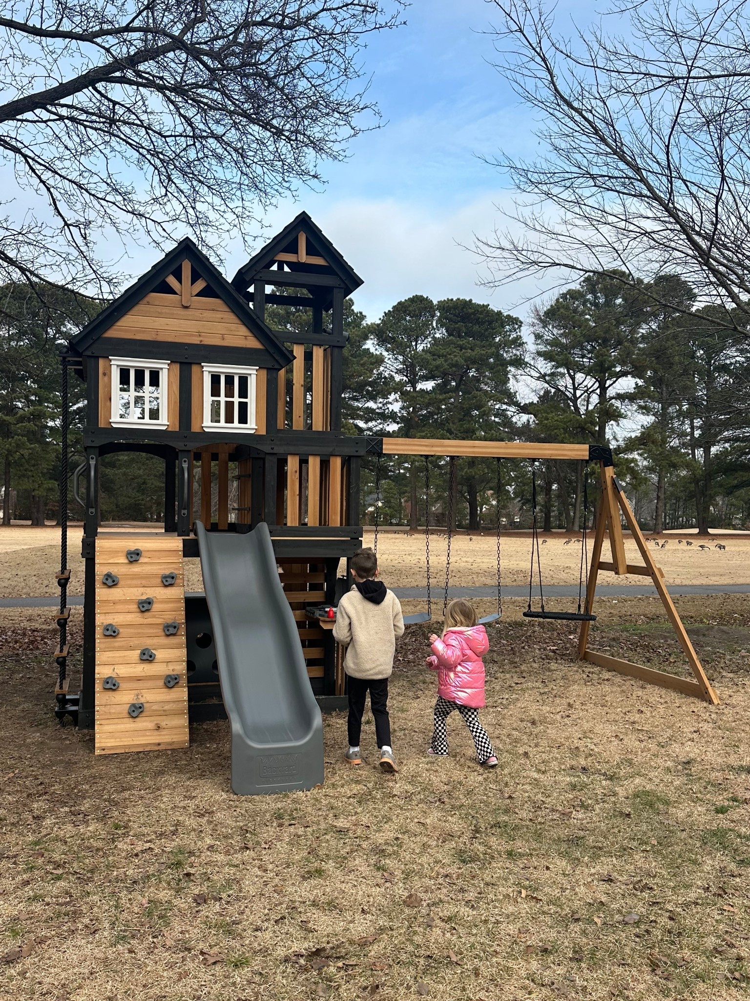 this swing set is so fun!! has a rock wall, 2 levels, tunnel, secret door, and more! 

#LTKKids
