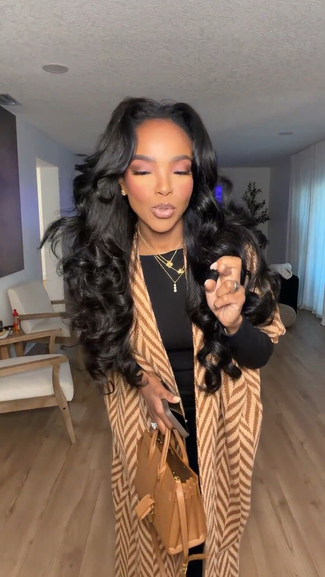 This is one of those outfits that instantly makes you feel put together the moment you step out the door. The long statement coat elevates the entire look, while the black base keeps it timeless and easy to rewear season after season. This is the kind of piece that makes every simple outfit feel intentional.

I love investing in outerwear like this because it’s styled multiple ways and works with so many outfits — dresses, denim, work looks, or travel days. The cost per wear drops fast when it becomes your go-to finishing layer.

Perfect for:
• Work days
• Meetings or site visits
• Travel days
• Fall and winter errands

📏 Sizing:
Coat: Size Small  
Dress/Top: Size Small  
Boots: True to size  
Bag: One size

This look hits all the marks for elevated everyday style, classic layering, neutral outfits, fall fashion inspiration, chic outerwear, and versatile wardrobe staples that work year after year.

Tap to get details and see everything linked.

Follow me on Instagram and YouTube @kirasfashionfinds

