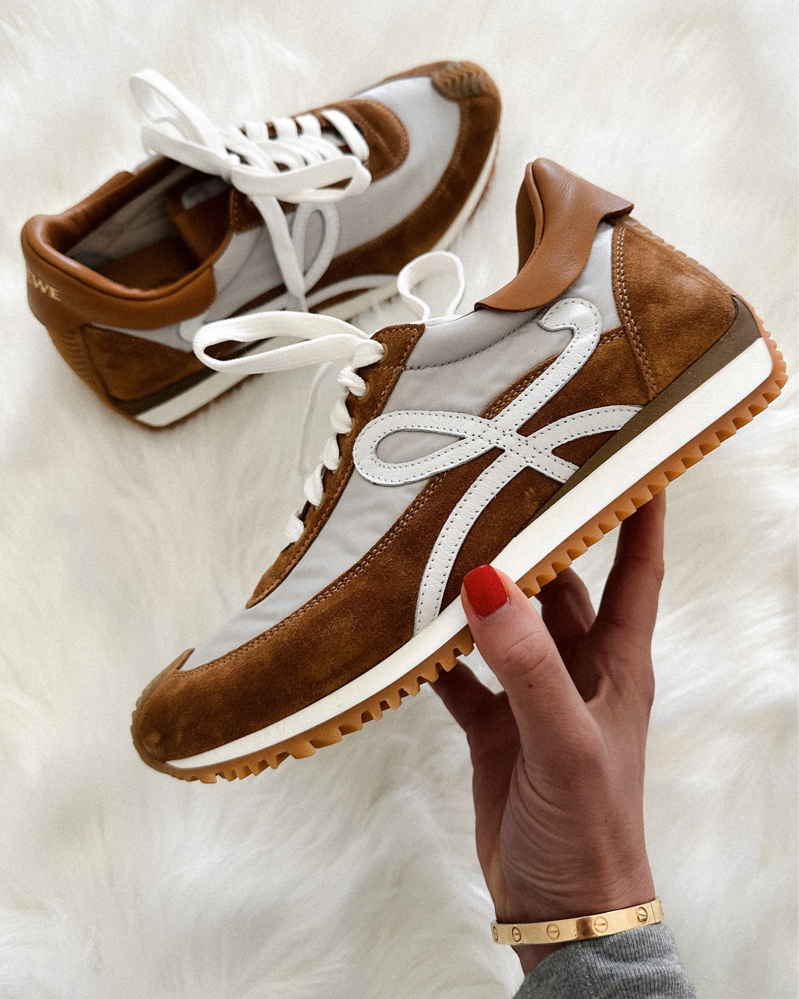 Loewe sneakers. They are heavier than most of my sneakers but they are COMFORTABLE! run small so size up. I’m normally a 38 in sneakers and got a 39. They don’t need to be broken in. Love the color #fashionjackson #sneakers 

#LTKshoecrush #LTKstyletip