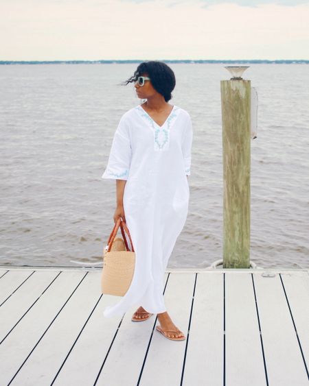 Check out Fanm Mon ready to wear collection at HerStory market. I love this white linen caftan dress for summer activities. The green and blue embroidered details are stunning. Runs roomy  

#LTKSwim #LTKTravel #LTKStyleTip