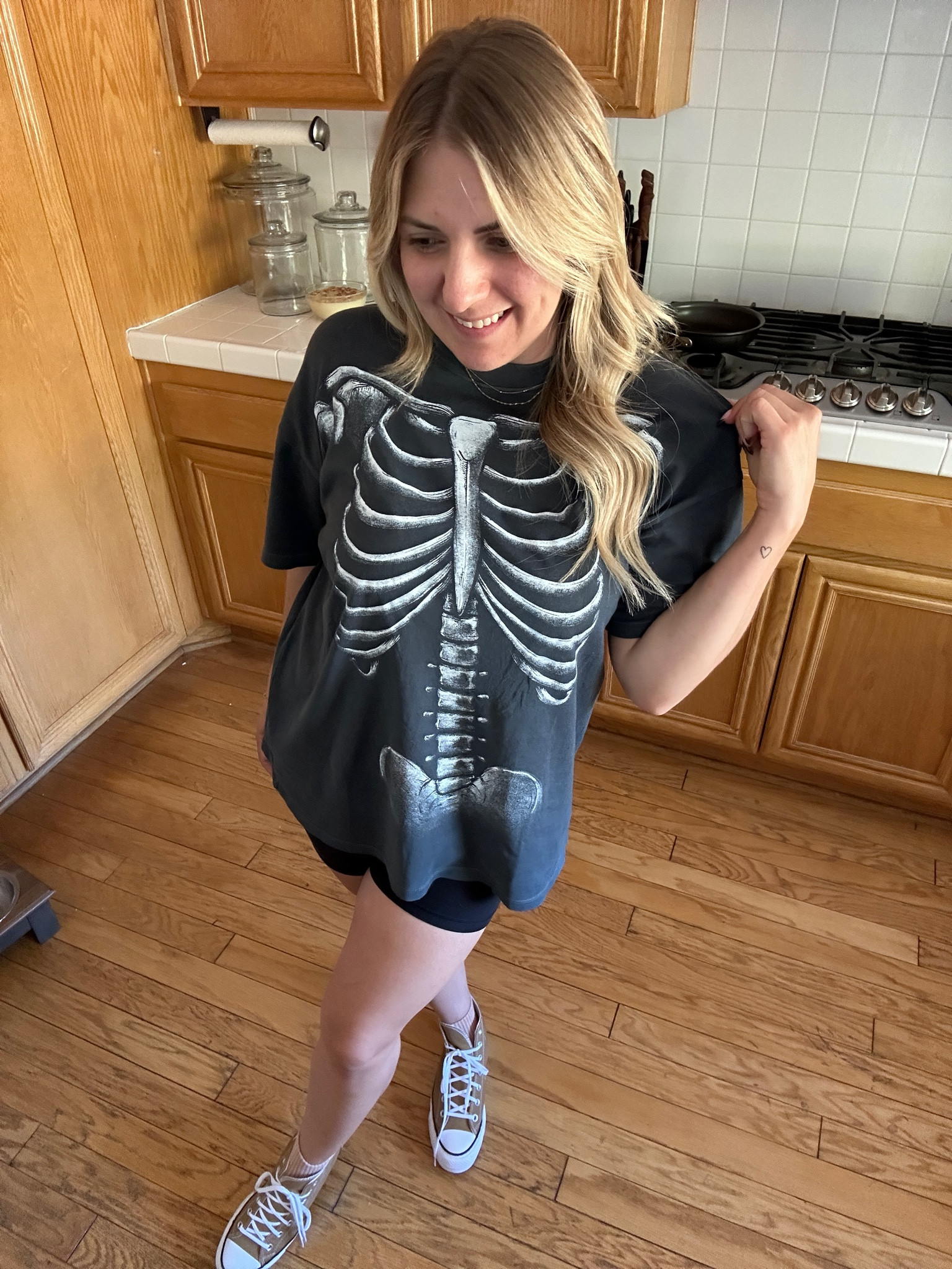 AND IT GLOWS IN THE DARK!!!! Oversized, size down 1 size for a true fit. This is a medium, I like it to be baggy and have the feeling like I’m wearing my bf’s shirt so I stuck to my regular size  

#LTKMidsize #LTKFallSale #LTKSeasonal