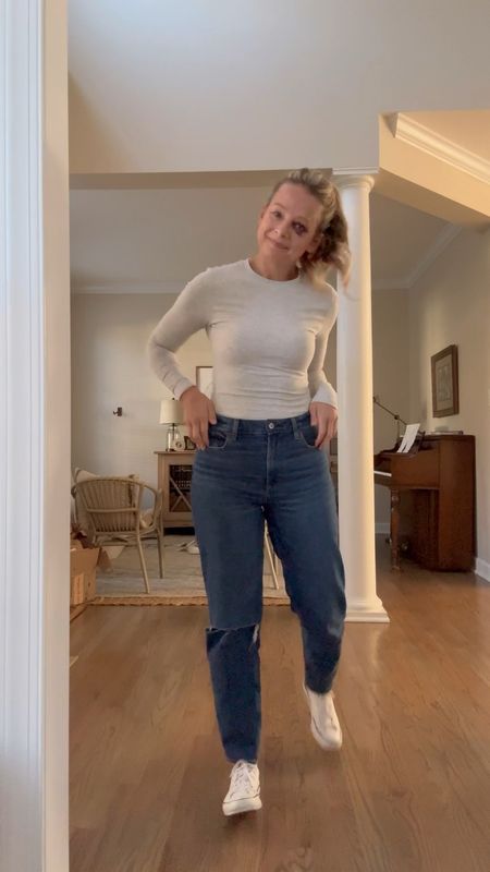 The best fitted long-sleeve tuckable tee with my favorite straight leg jeans! You don’t have to wear a bodysuit to get the streamlined look of a tucked in, fitted tee.

#LTKfindsunder50 #LTKstyletip