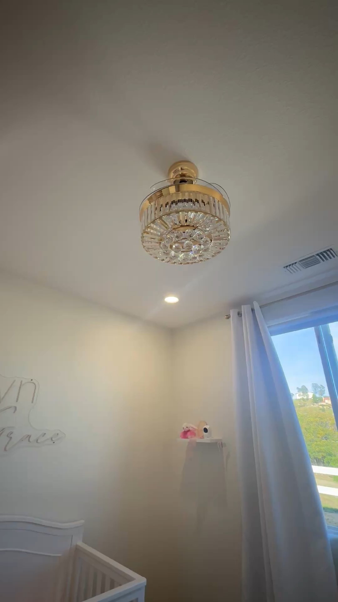 The most amazing fandelier. The blades come out when you turn it on, and when it's off, they hide and all you see is the pretty crystal and lights  

#LTKHome #LTKWatchNow #LTKFamily