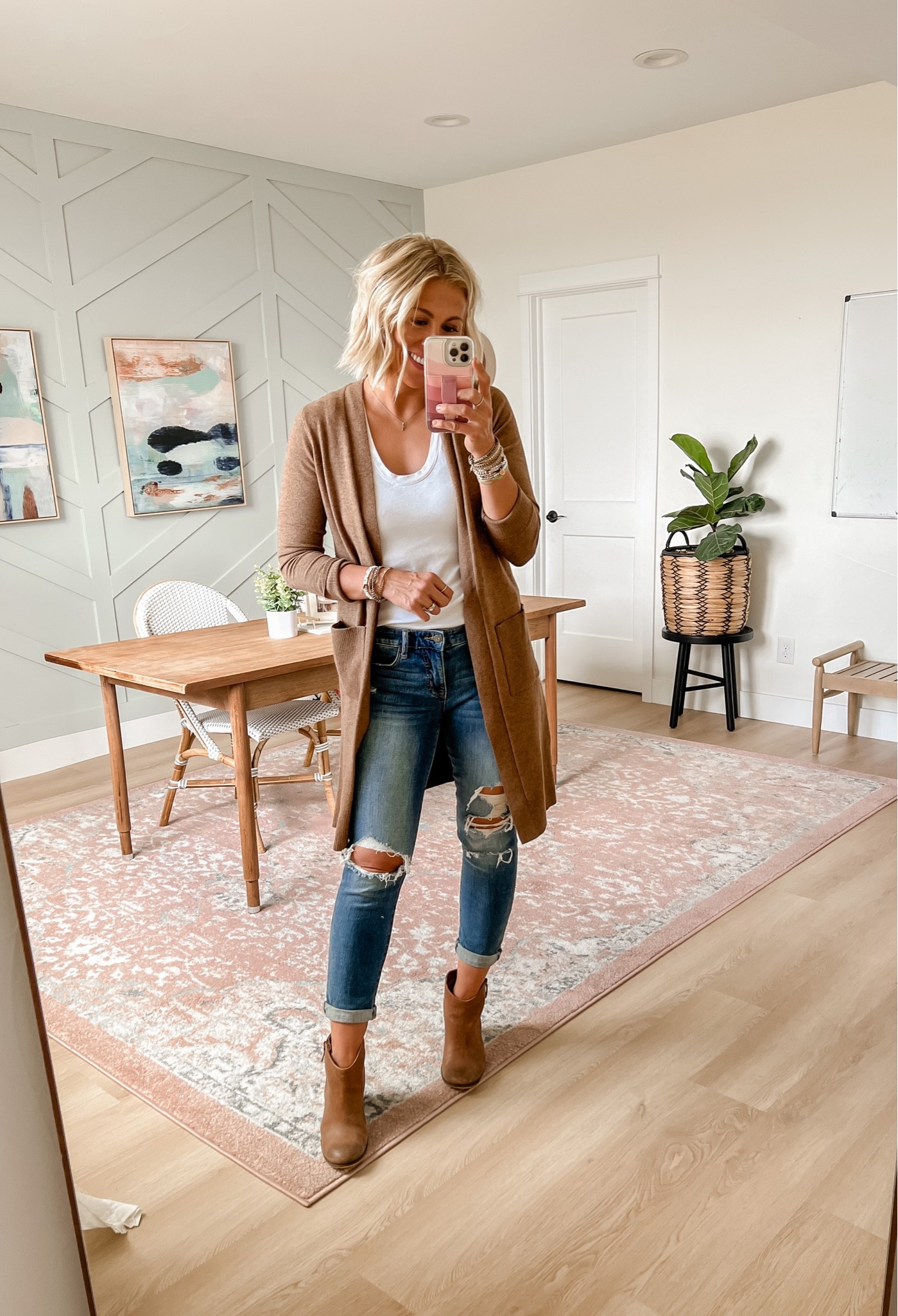 Long flowy cardigan 
Wearing medium 
$16—comes in several colors 

Jeans run big, size down! 

#LTKSeasonal #LTKsalealert #LTKunder50