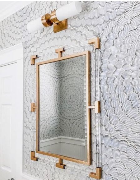 Wallpaper mirror and sconce in our guest bathroom 

#LTKhome #LTKsalealert #LTKstyletip