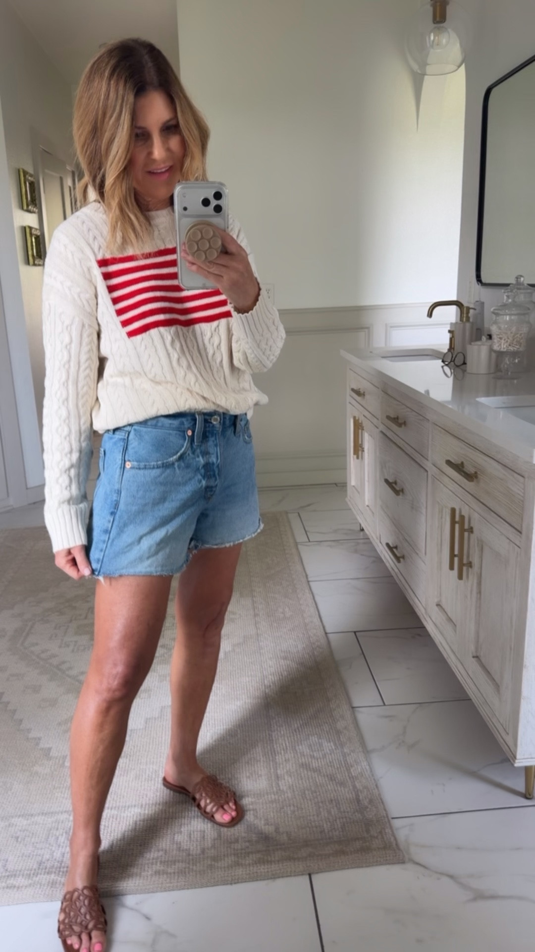 Wearing a size small sweater and size 4 in shorts 

#LTKOver40