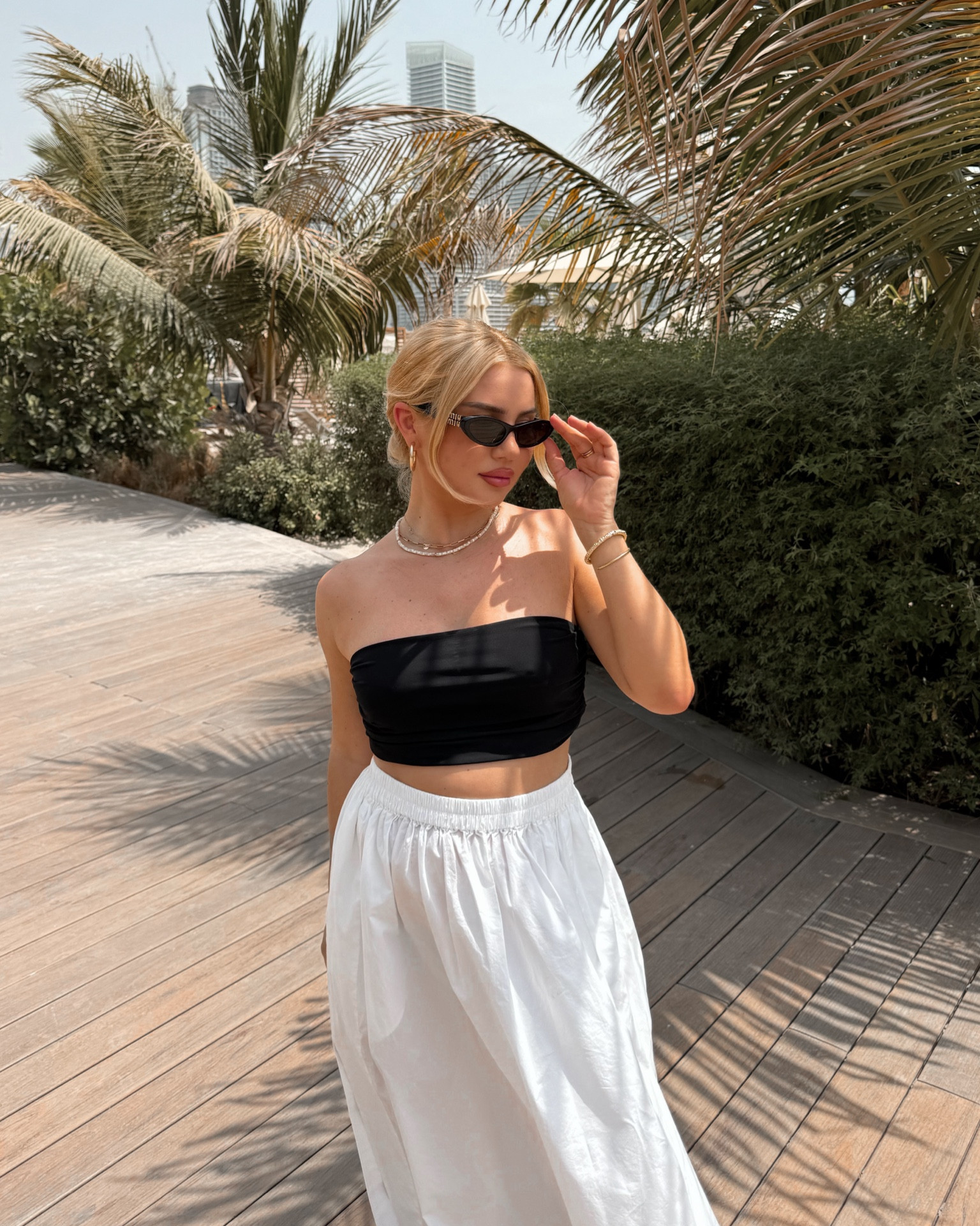 simple and cute 🖤🤍 summer style, holiday style, hm, white maxi skirt, tube top, summer ootd, miumiu, summer fashion #LTKsummer #LTKeurope

#LTKtravel #LTKstyletip
