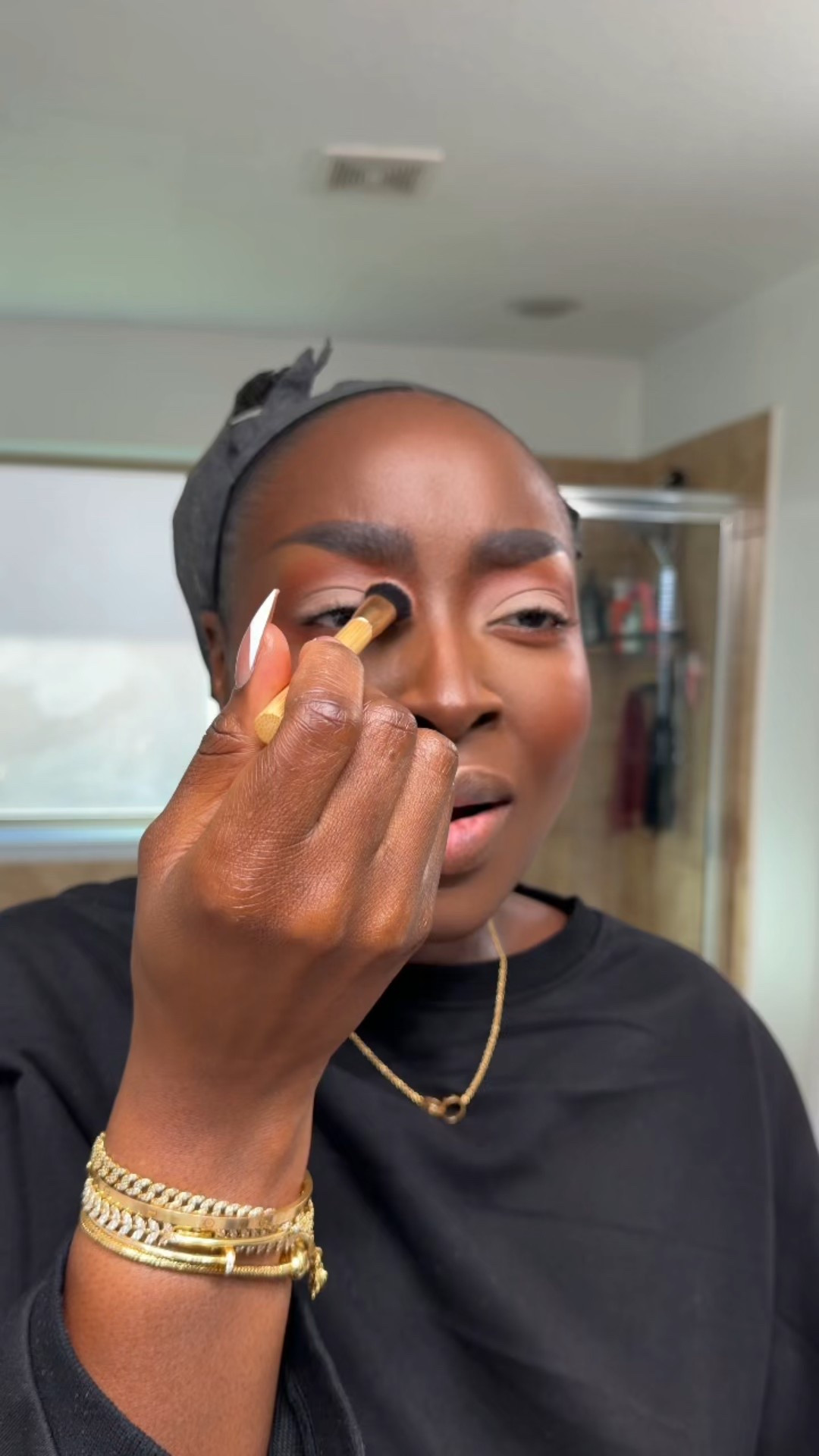 Continuing to tie in the entire eyeshadow look, I take the reddish/orange brown color and blend that into the light color. 

#LTKgrwm #LTKBeauty