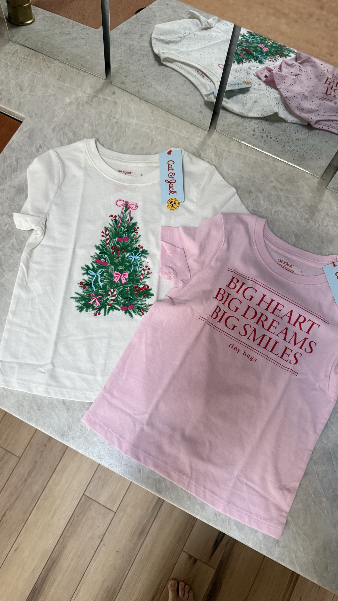 Target girls’ tees that are too cute to pass up 💕🎄 Loving the mix of festive and everyday that Christmas tree graphic is perfect for the holidays, and the “Big Heart Big Dreams Big Smiles” tee is just the sweetest year-round reminder 

#TargetHoliday #TargetKids #TargetFinds #CatAndJack #GirlsOutfits #HolidayStyle #ChristmasOutfit #KidsFashion #TargetChristmas #CozyChristmas #TargetStyle #HolidayAesthetic #ChristmasOutfits Cat & Jack girls holiday shirts, Target Christmas kids clothes, girls Christmas tee Target, festive kids fashion, Target kids holiday collection 2025, everyday girls outfits Target, Cat and Jack graphic tees 

  

#LTKKids #LTKHoliday #LTKHoliday #LTKSeasonal #LTKKids