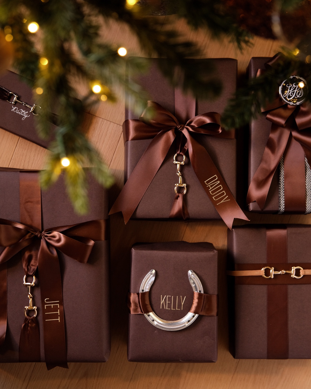 Brown wrapping paper and brown satin ribbon. The names are stickers! #meandmrjones 

#LTKHoliday #LTKSeasonal #LTKGiftGuide