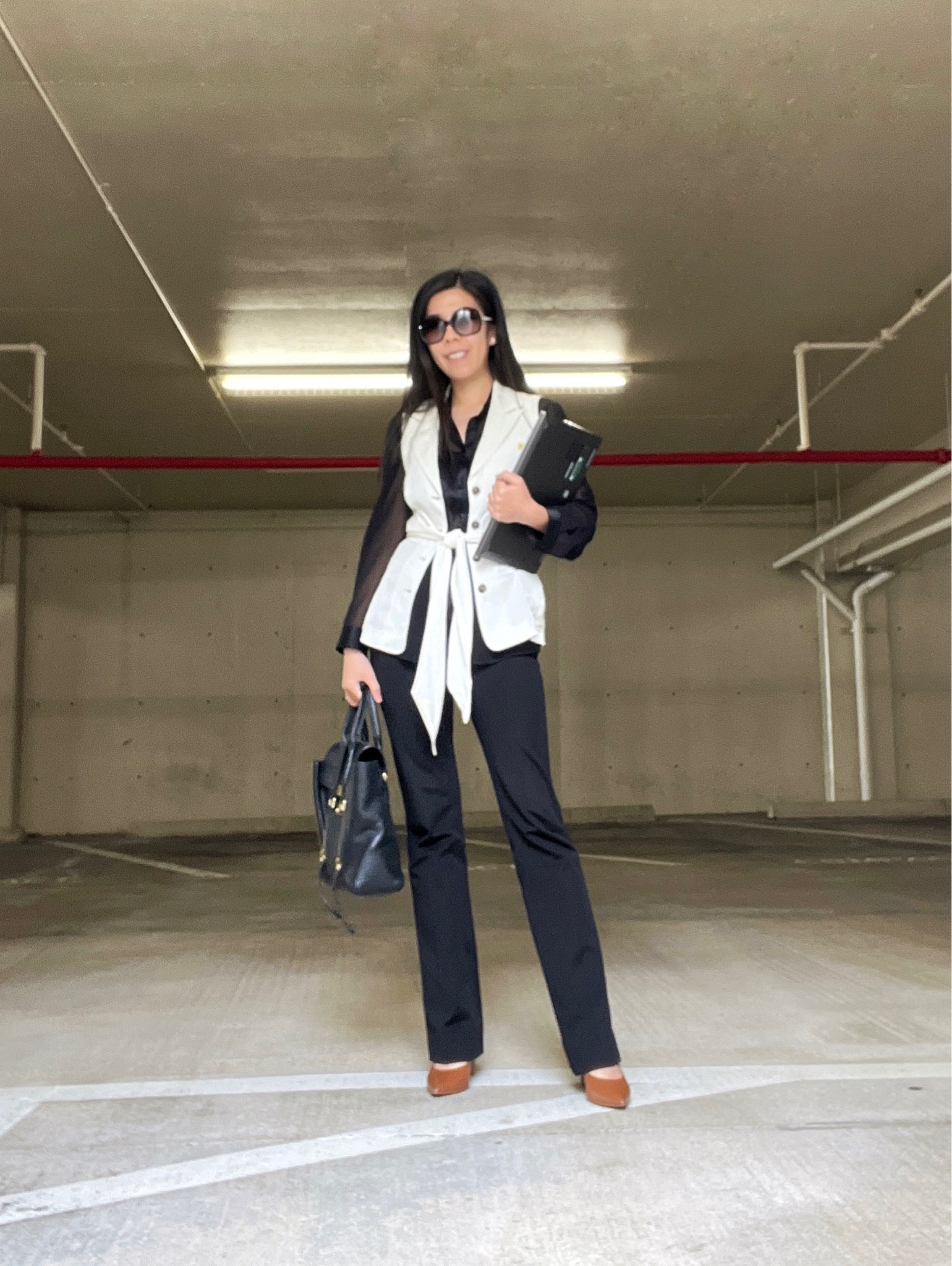 Black and white corporate attire never fails! I wanted to wear this cream hip bow tie waistcoat to work but it’s very low cut. To make it more appropriate, I layered it on top of a sheer black collar button-up shirt! 

#LTKitbag #LTKworkwear #LTKstyletip