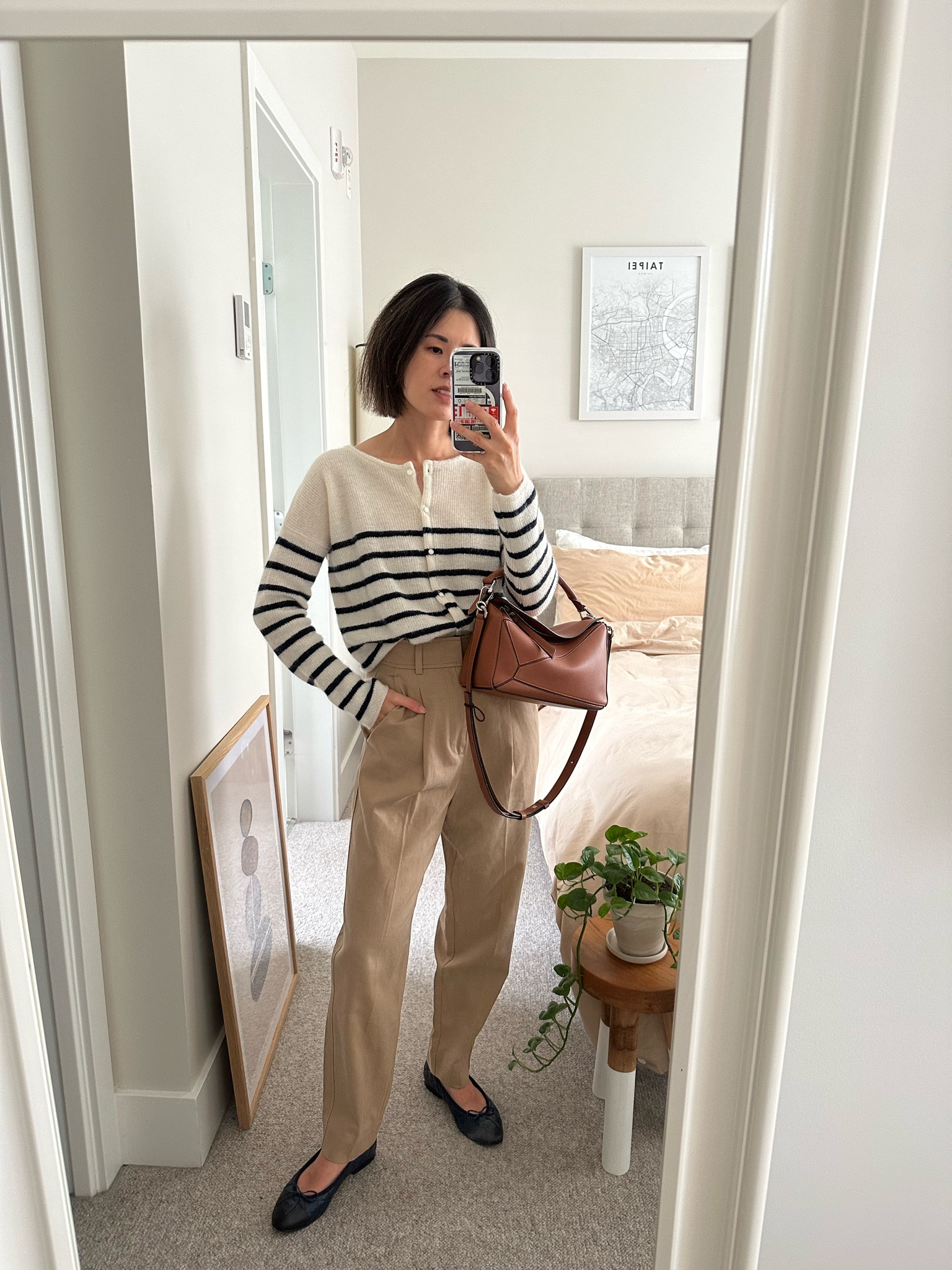 Top: Sezane Gaspard cardigan. Runs a big large. I’m in xs
Pants: Everlane. Tts
Flats: Chanel
Bag: Loewe puzzle small