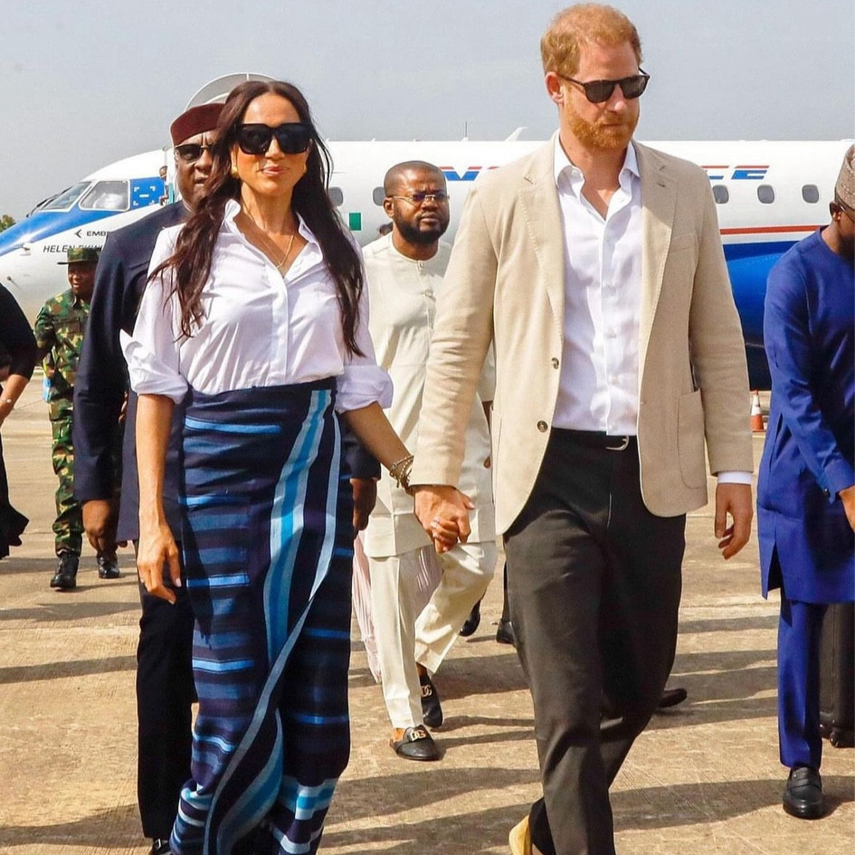 Wearing a traditional #Nigerian fabric skirt that she was gifted the day before, Meghan was radiant in a button-down and chic sunglasses. We love the incorporation of the local fashion with a classic wardrobe staple everyone has in their closet. 

#LTKStyleTip #LTKTravel #LTKOver40