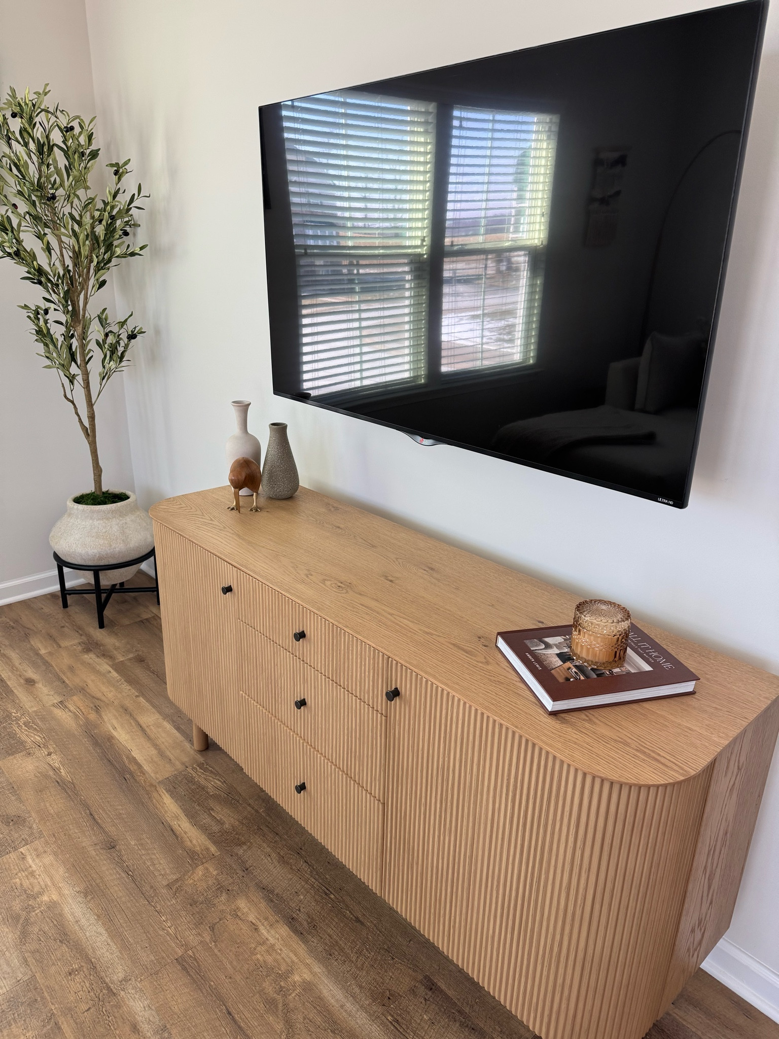 Linking my buffet. (And most of the decor on top.) This could be used it either a living room or dining room. It has so much storage, too. I’m obsessed. (The wood color is blonde.)

The only thing I couldn’t link is the candle on top of the book, as it was a gift. 
