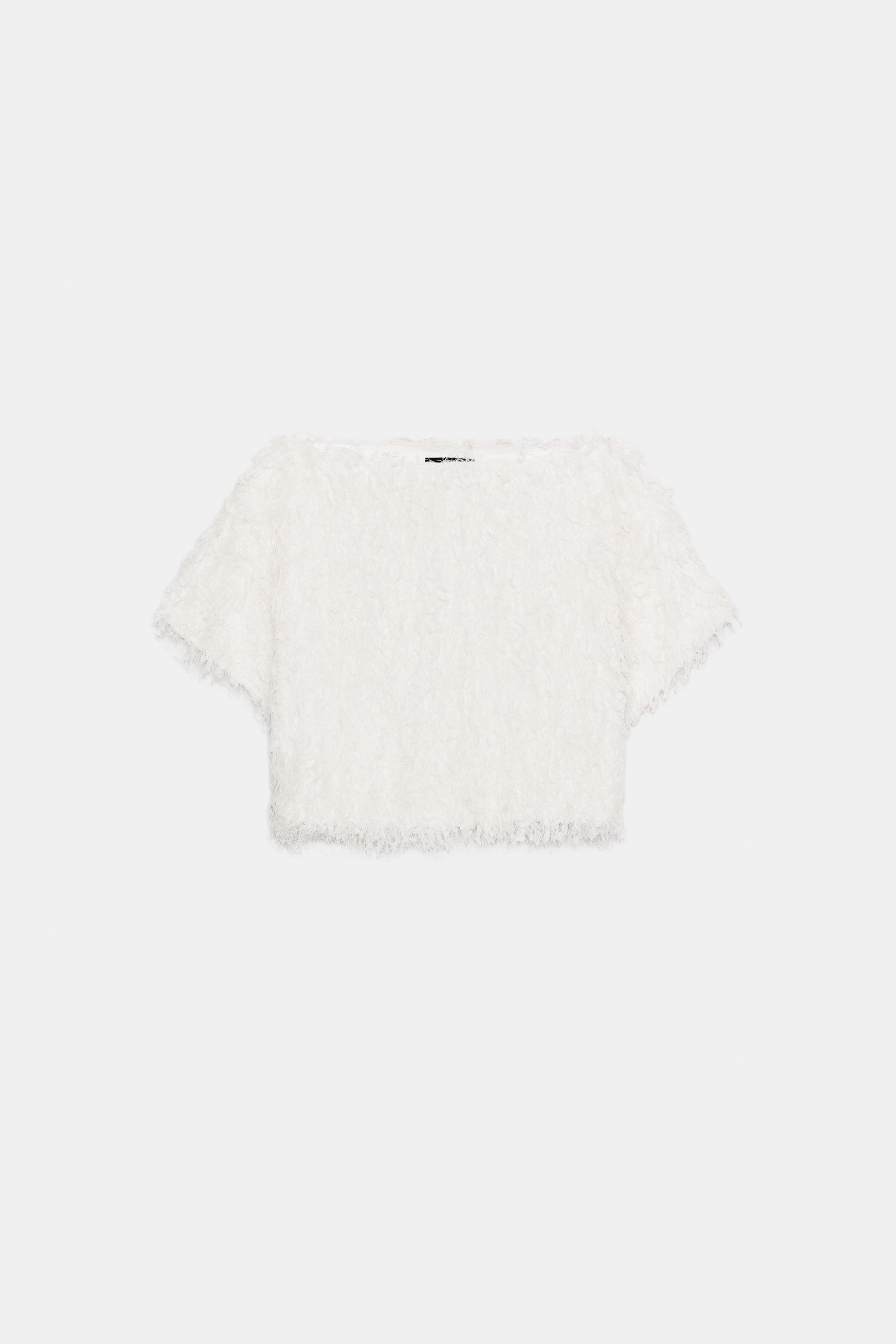 Top with fringe, boat neck, and short sleeves. | Zara US