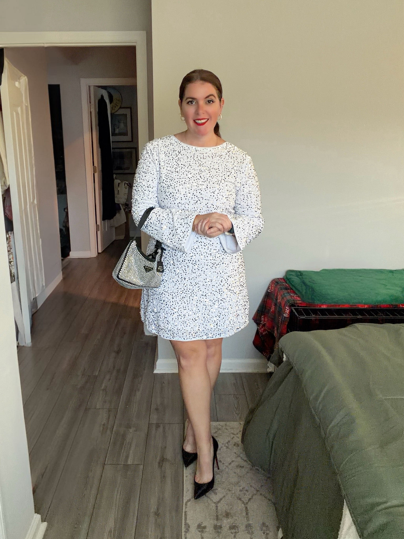 Sequins on NYE is a must for me!! This dress is from CUPSHE and it’s under $40! Not only was this the perfect dress for NYE, but this would be a great date night dress or even a good dress for a 2026 bride! The dress runs TTS (I’m in a medium)! 

#LTKSeasonal #LTKMidsize