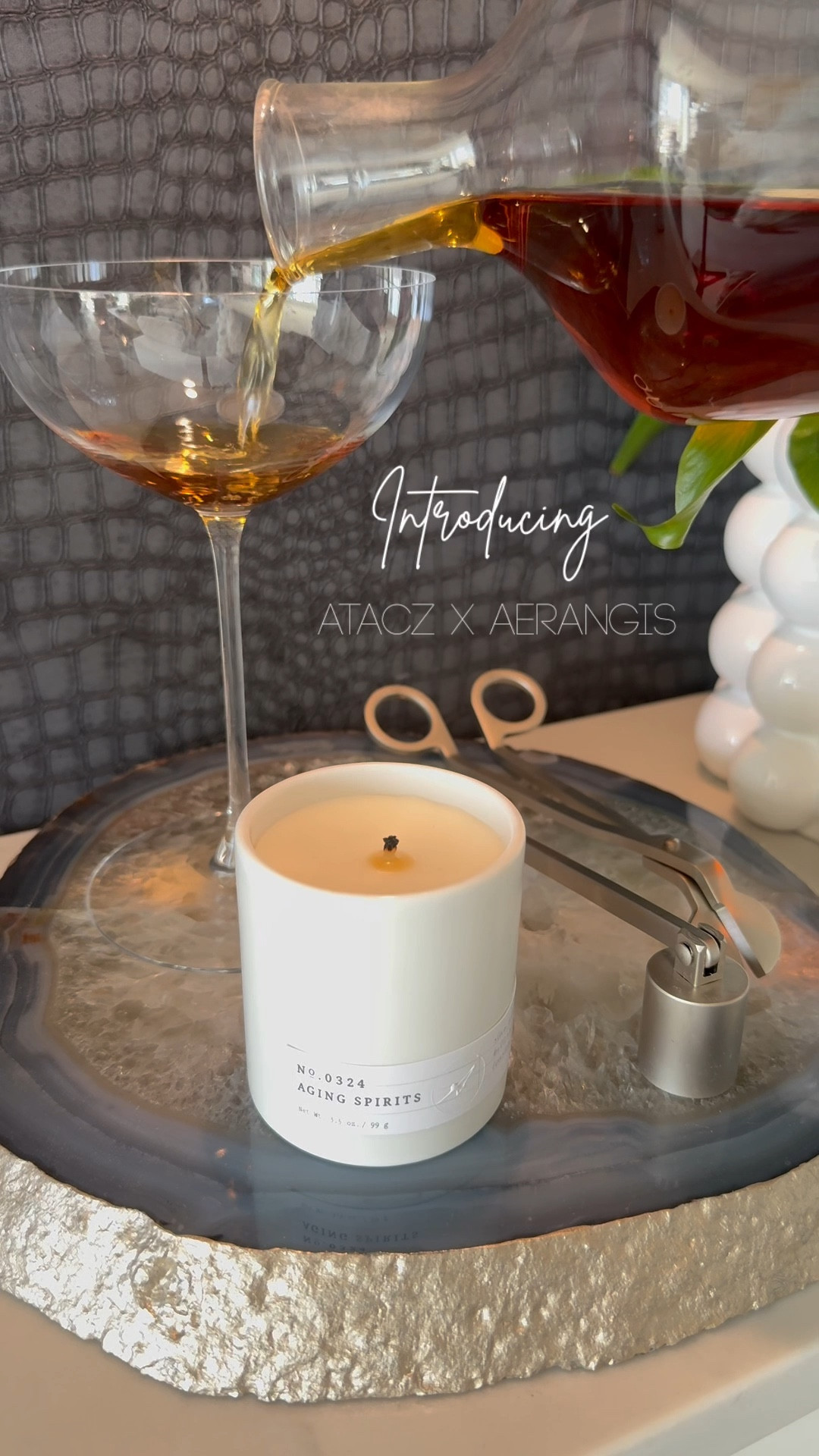 ✨✨✨ You all know I love hosting. And that means I get a lot of hostess gifts. While I’ll never be sad if someone brings a bouquet of flowers or a nice bottle of wine, I need to share this thoughtful #gift from @aerangisny I recently received. #ad

✨ Introducing the Toast and Tote: Atacz x Aerangis Bundle Gift Set—a sophisticated pairing that evokes the elegance of a fine wine and a bouquet, but with a timeless twist. This luxurious set includes the No. 1 The Beginning and No. 0324 Aging Spirits scented candles, accompanied by a chic tote crafted from recycled plastic bottles—both stylish and eco-conscious.

✨ Each candle is hand-poured in the USA using a plant-based wax blend for a clean, even burn, with lead-free cotton wicks and phthalate-free fragrances. To add a sustainable touch, every candle features a biodegradable dust cover infused with wildflower seeds, which can be planted in the jar once the candle has burned down. Elevate your candle experience with the sleek, functional care tools, designed to promote an even burn and extend the life of your candles.

#LTKStyleTip #LTKGiftGuide #LTKHome