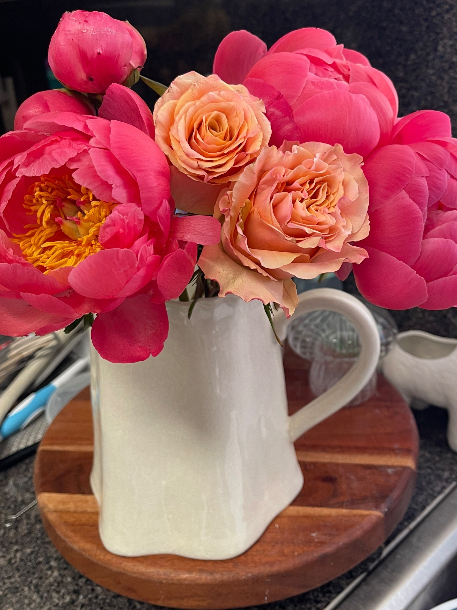 Beautiful peony and garden rose stems in a Magnolia Vintage Inspired Crackle Pitcher

#LTKHome #LTKSummerEdit #LTKFindsUnder50