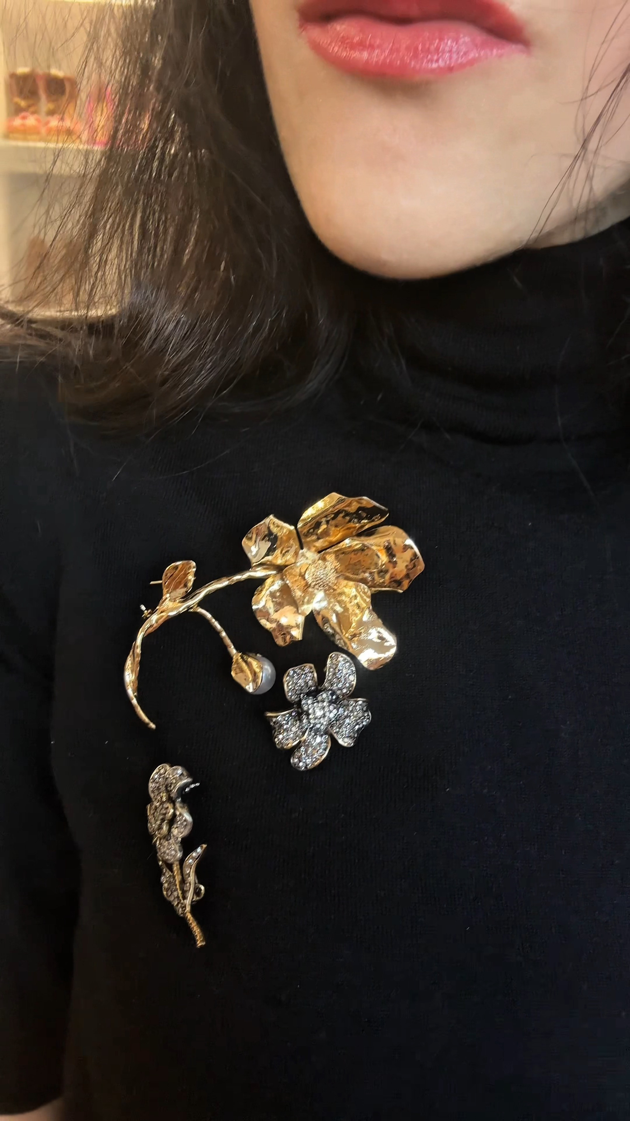 brooch aesthetic, brooched, maximalist accessories, floral brooch, bug brooch, Brooch styling, how to stack brooches, vintage brooch layering, gold flower brooch, crystal brooch outfit, jewelry styling, festive accessory ideas, black turtleneck brooches, statement brooch look, winter jewelry trend, accessories, antique brooch collection, floral brooch cluster, brooch stacking tutorial, vintage jewelry styling, outfit details, gold and crystal brooches, accessorizing ideas, sophisticated look, everyday outfit, gold brooch styling, black top green skirt, floral tiered skirt, everyday look, chic outfit, brooch outfit ideas, green outfit, ruffled mini skirt, statement brooch look,  fashion inspiration, elegant attire, vintage brooch outfit,  accessory styling, green floral skirt. outfit, sophisticated look 

 #LTKdayinmylife #LTKootd #LTKFindsUnder50