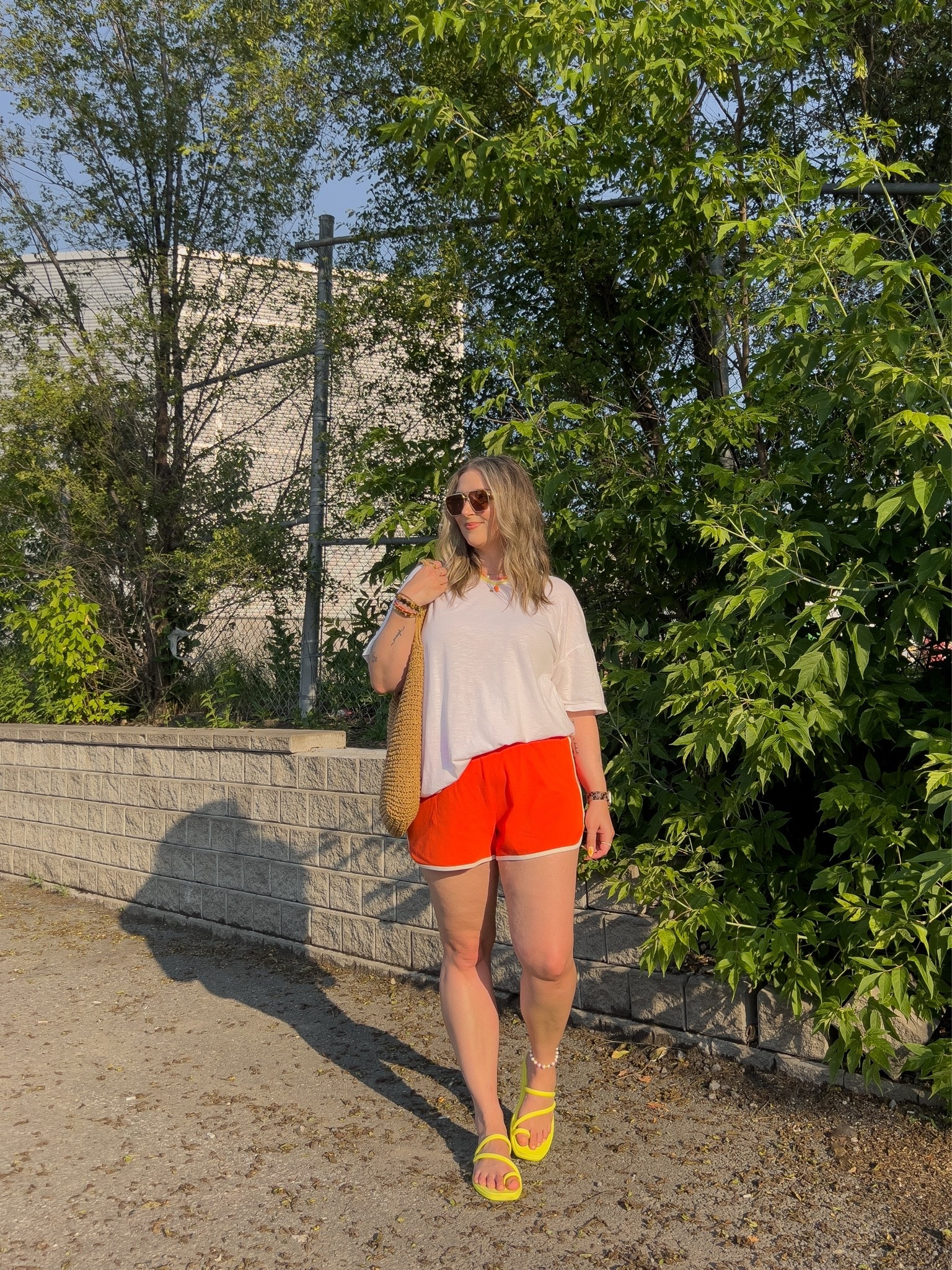 Comfy casual summer outfit! Wearing my usual size L in both the white tee and red orange dolphin shorts. Crocs sandals are super comfy, I’m a 9.5-10 and wear a 10

#LTKsummer #LTKmidsize #LTKsale