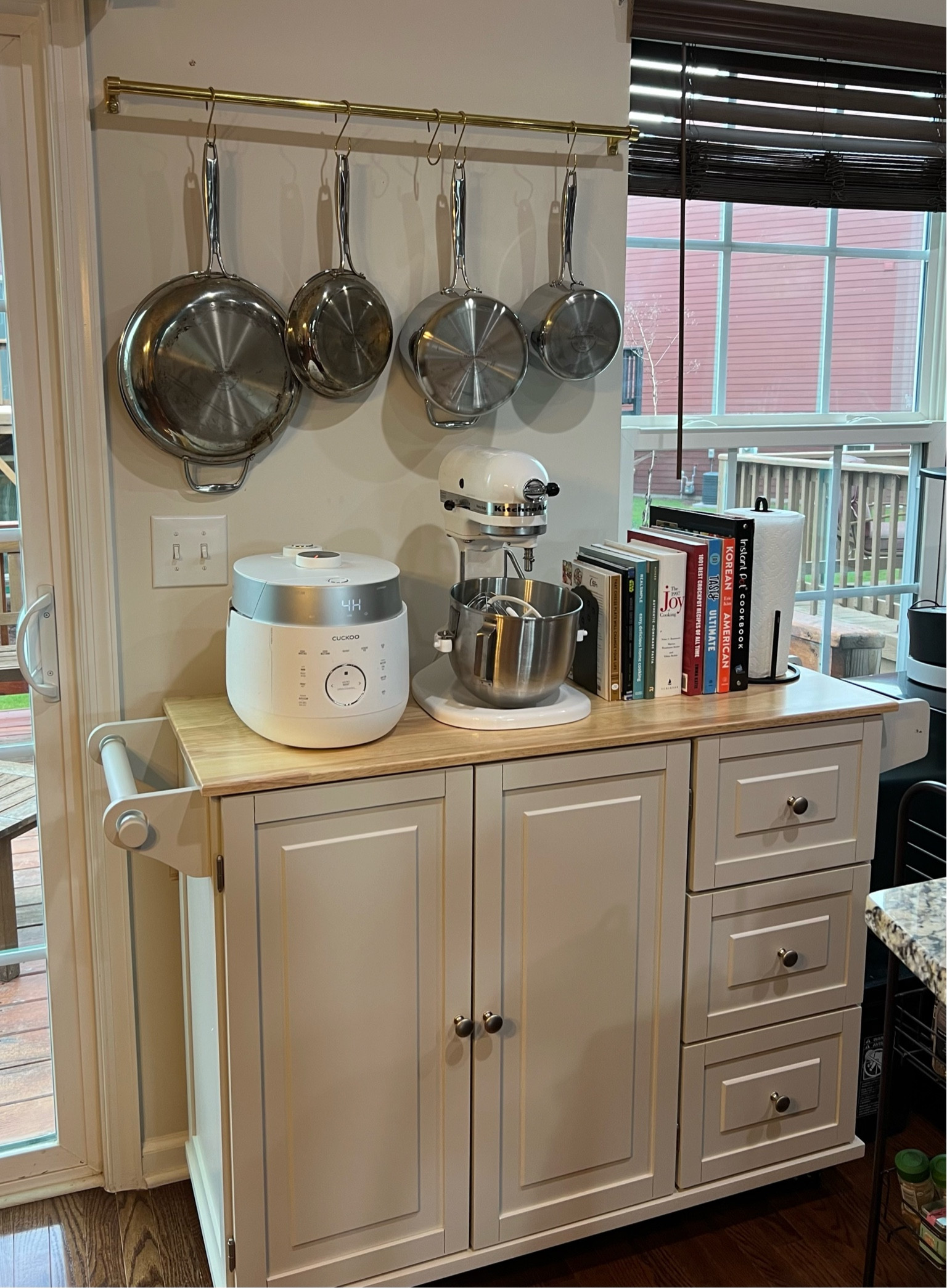 Unexpected Saturday spent home (on a rainy day too!) meant building a kitchen cart for more storage! The color is a little bit lighter than it looks on the website.

#LTKHome