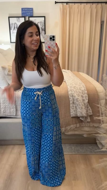 If you're looking for a great summer vacation outfit, add these to your cart immediately! I'm in a medium, and obsessed with how comfortable these blue wide leg pants are (love a stretchy waistband!) and that this pair of patterned pants almost looks like a skirt.

#LTKFindsUnder50 #LTKStyleTip #LTKSeasonal