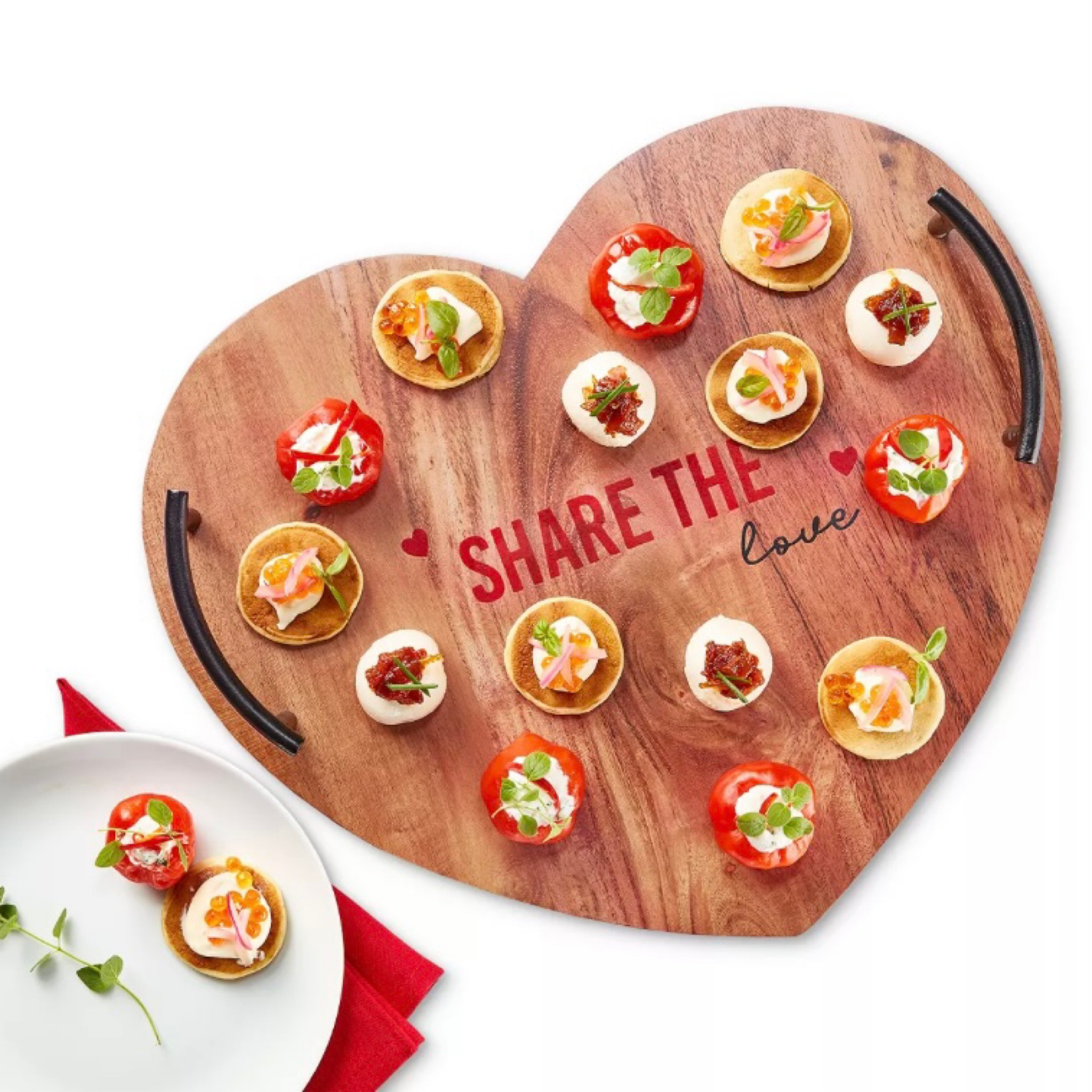 Heart Tray, Created by Macy's

Share more than just appetizers using this heart-shaped tray from The Cellar, in warm wood decorated with the phrase, "Share the Love." Steel handles make it easy to transport.

Approx. dimensions: 13.78"L x 11.81"W x 1.97"H
Created for Macy's
Acacia wood/mild steel
Wipe clean

#LTKSeasonal #LTKsalealert #LTKhome