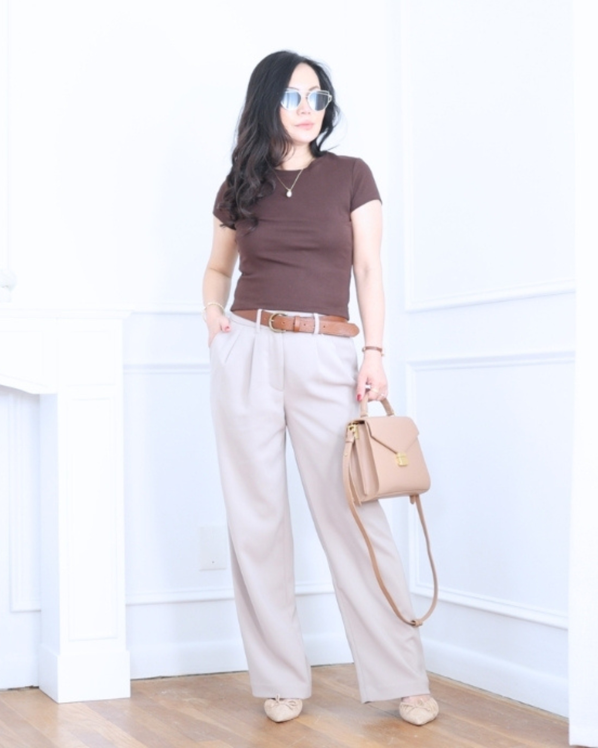 Cropped tee from Uniqlo paired with pleated wide-leg pants from Quince — relaxed, modern, and effortlessly polished for an easy everyday look. I'm 5'2, wearing size S. 

 #LTKootd #LTKOver40 #LTKPetite