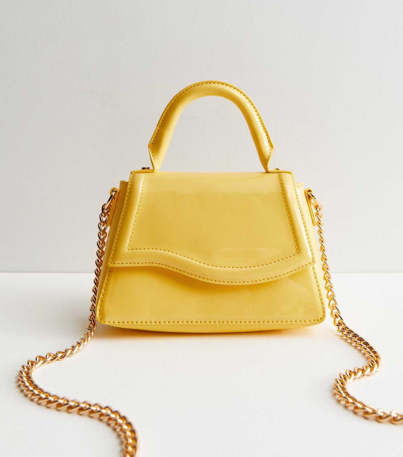 Yellow Patent Top Handle Chain Cross Body Bag
						
						Add to Saved Items
						Remove from S... | New Look (UK)